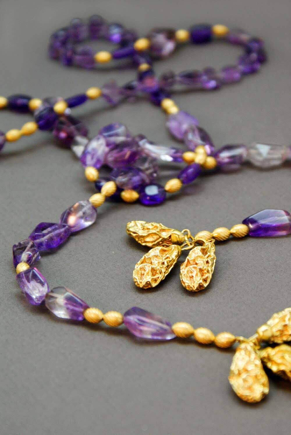 brass-raisins-lariat-necklace-purple.jpg