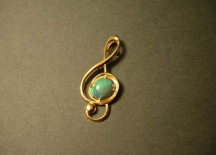gold-and-opal-treble-clef-pendant.jpg