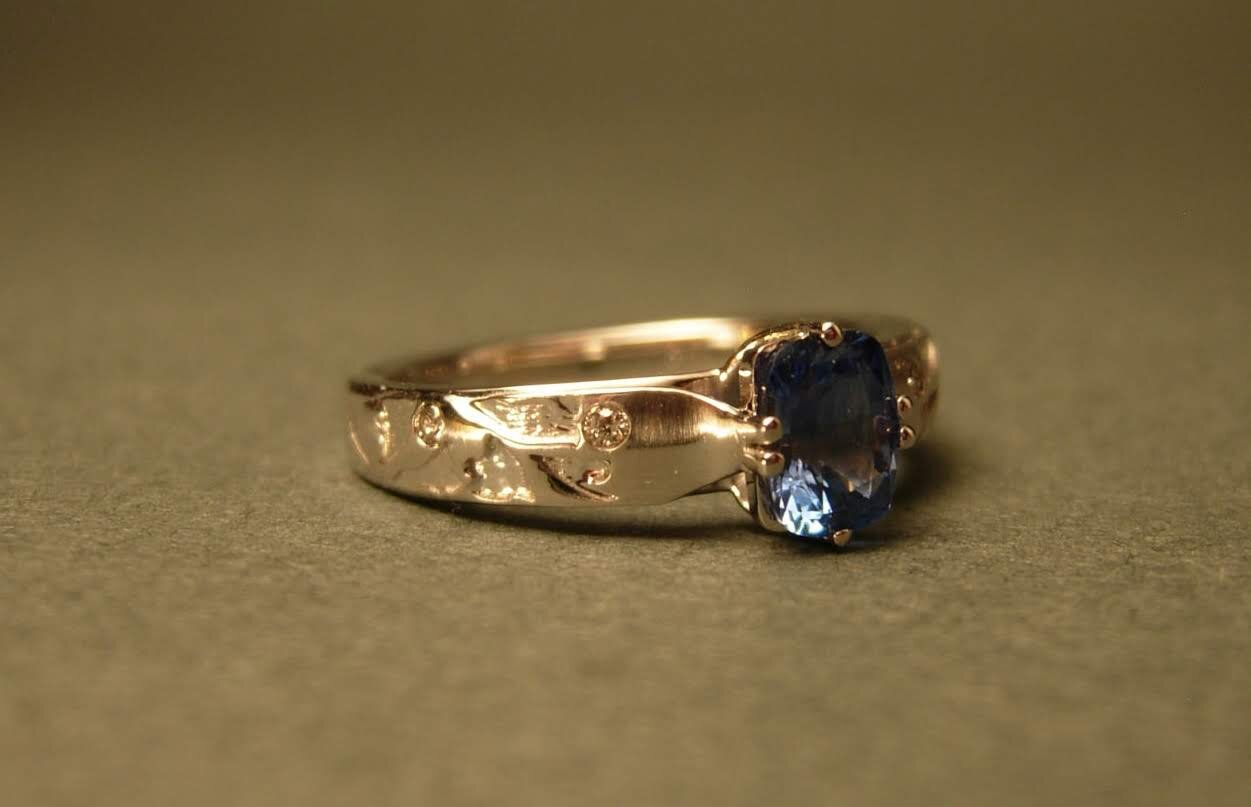 gold-and-sapphire-engagement-ring.jpg