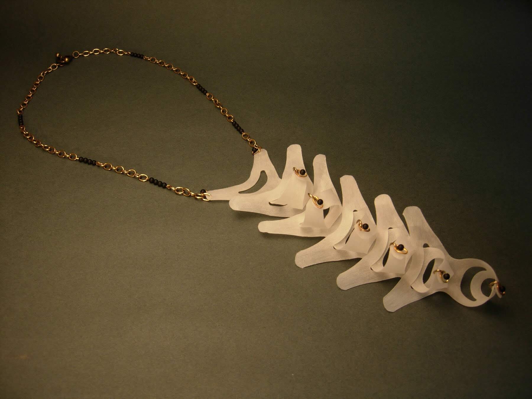 vertebrae-upcycled-plastic-rings-and-brass-statement-necklace-origomu.jpg