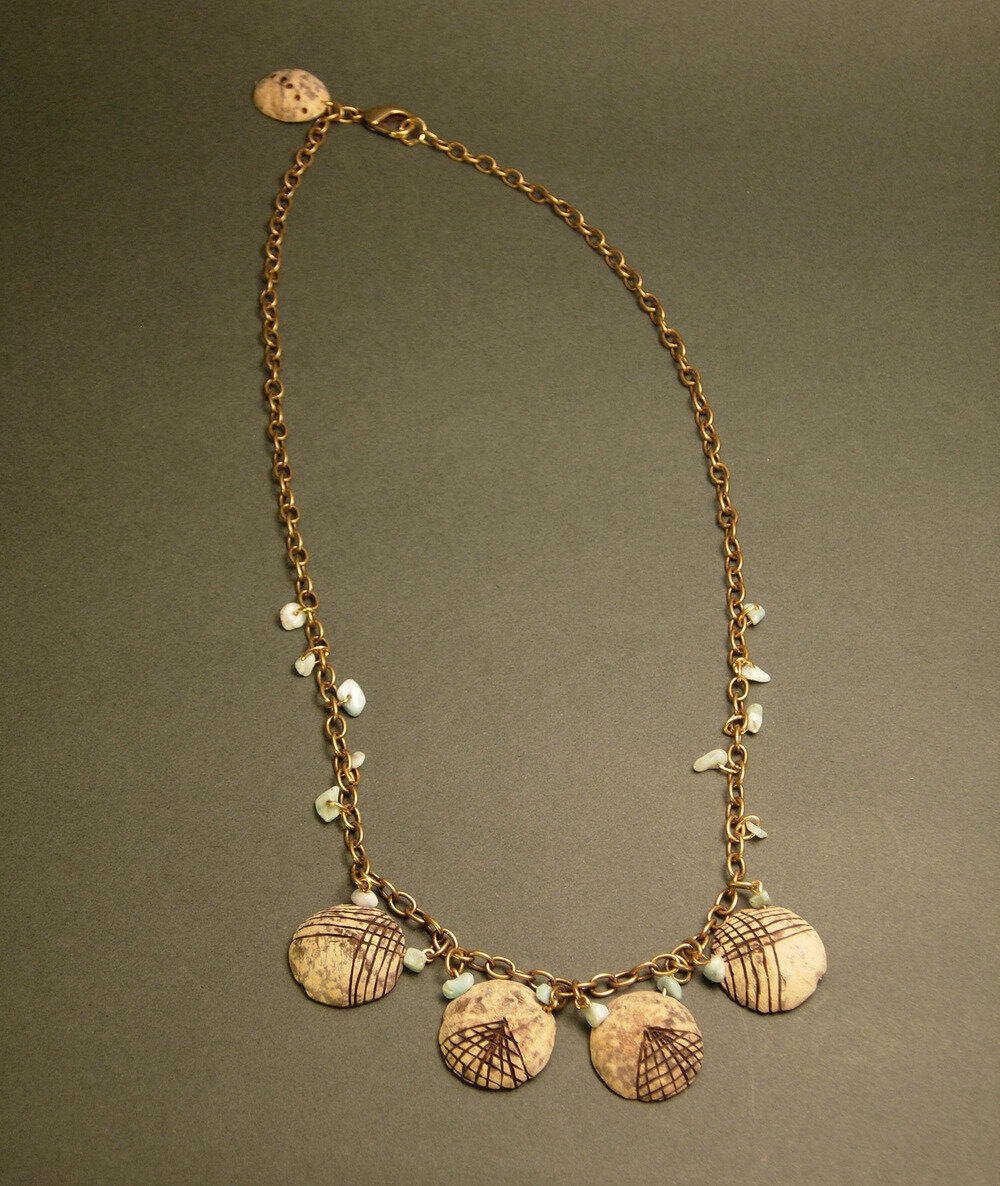 corozo-nut-wooden-necklace-with-larimar.jpg