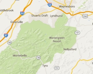 The green area on Google maps that includes and surrounds Wintergreen is what is in the "national forest."