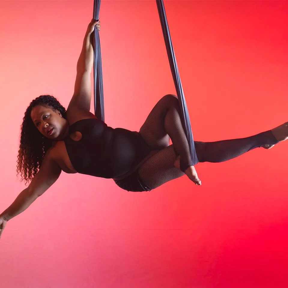 BEGINNER AERIAL HAMMOCK: In this beginner level class, from a single point, this is where we learn & build a foundation for our Aerial Hammock practice. We'll work on items such as conditioning, mounts, dismounts, transitions while challenging our balance. Beginners will move towards learning how to flow together poses and movement while gaining strength and improving flexibility. AERIAL HAMMOCK: In this multi level class, from a single point Aerial Hammock we will utilize the fabric to challenge our balance, build strength, alignment and flexibility. Beginner students will work towards piecing together poses and transitions to flow & create a beautiful dance. For Intermediate students the emphasis will be placed on learning creative combinations, dynamic movements, drops and sequencing. INTERMEDIATE AERIAL HAMMOCK: This class is for those who are ready to level up their aerial practise, on single-point hammock. Focus is twofold; refining technique to promote efficiency of movement, and exploring creativity in flow. After mastering beats, flairs, and rollups, and polishing transitions, lines, and sequencing, students will learn to add their own personal flair to their aerial to create performance-ready choreography. *PREREQUISITES students must already have a consistent aerial hammock practice. While you don’t have to be advanced you must already have strong inverts, and be comfortable working on sequencing - if you have prerequisite questions please call studio. Thx!