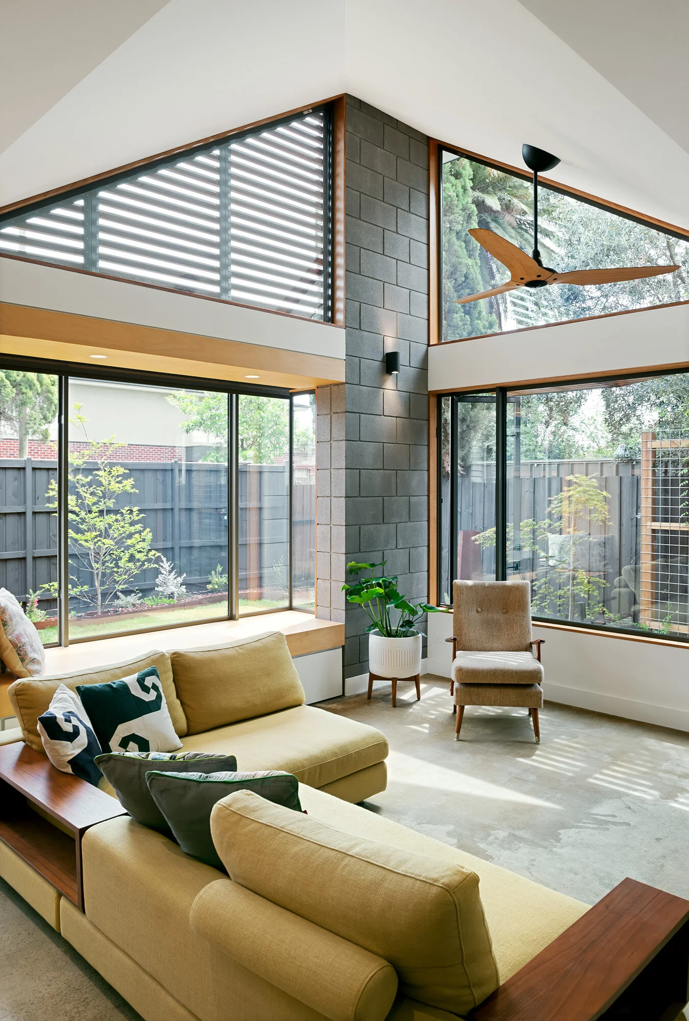 Thermal mass burnished concrete floor with north facing windows, concrete block spine
