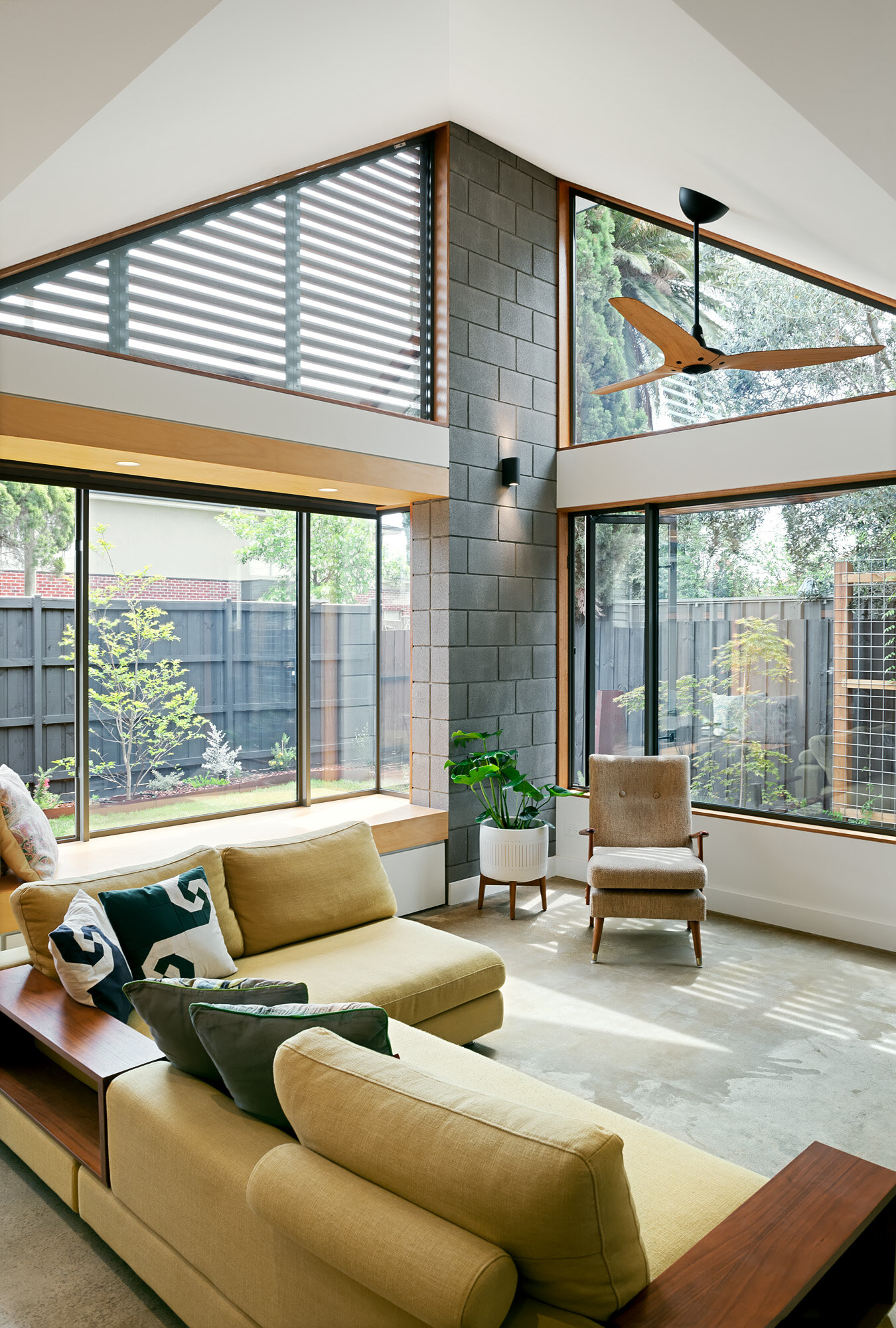North-facing living room with cross-ventilation and exposed thermal mass floor, Melbourne passive design home
