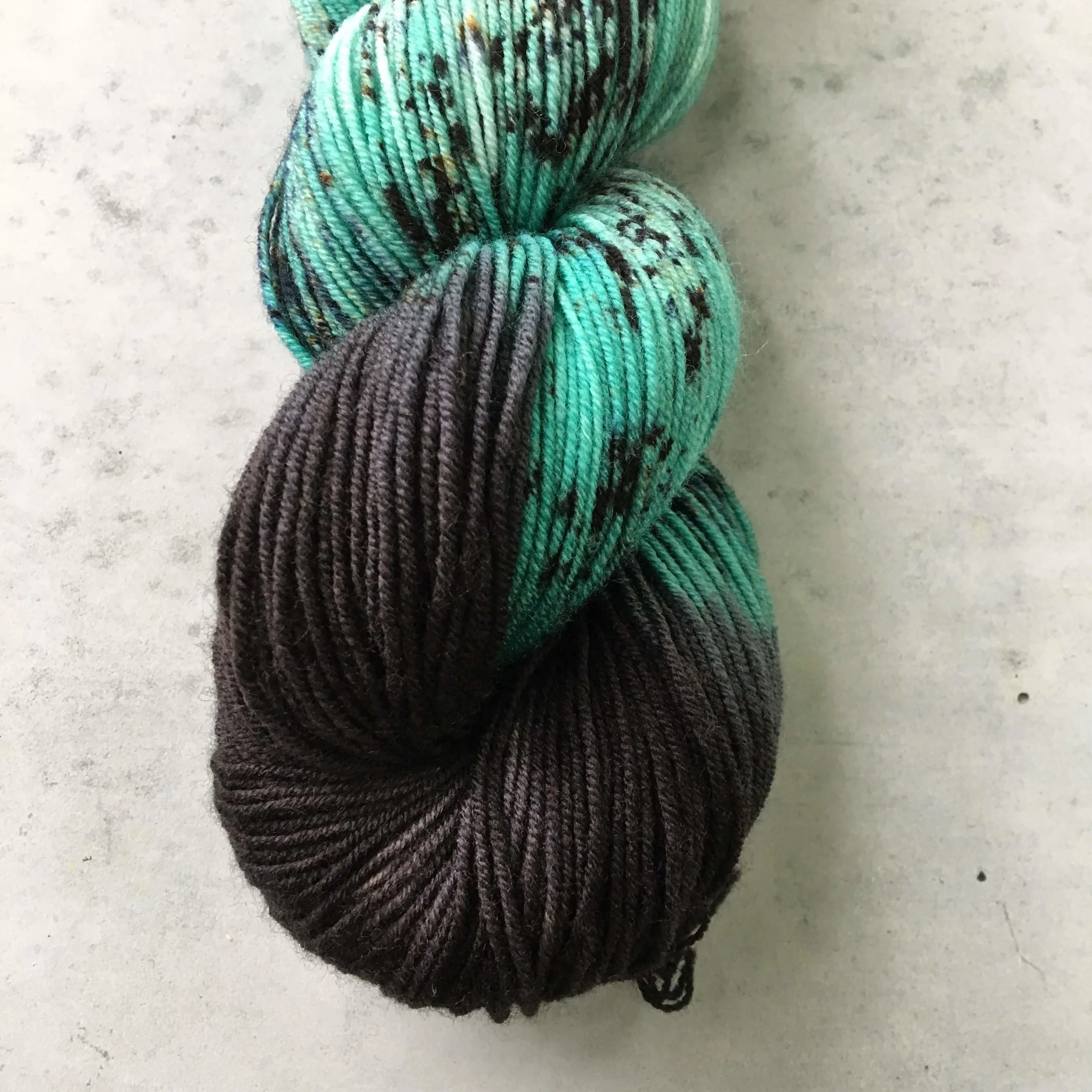Our new base Alder Fingering in July’s Aquatic Club colorway ‘Nudibranch Cristada’.