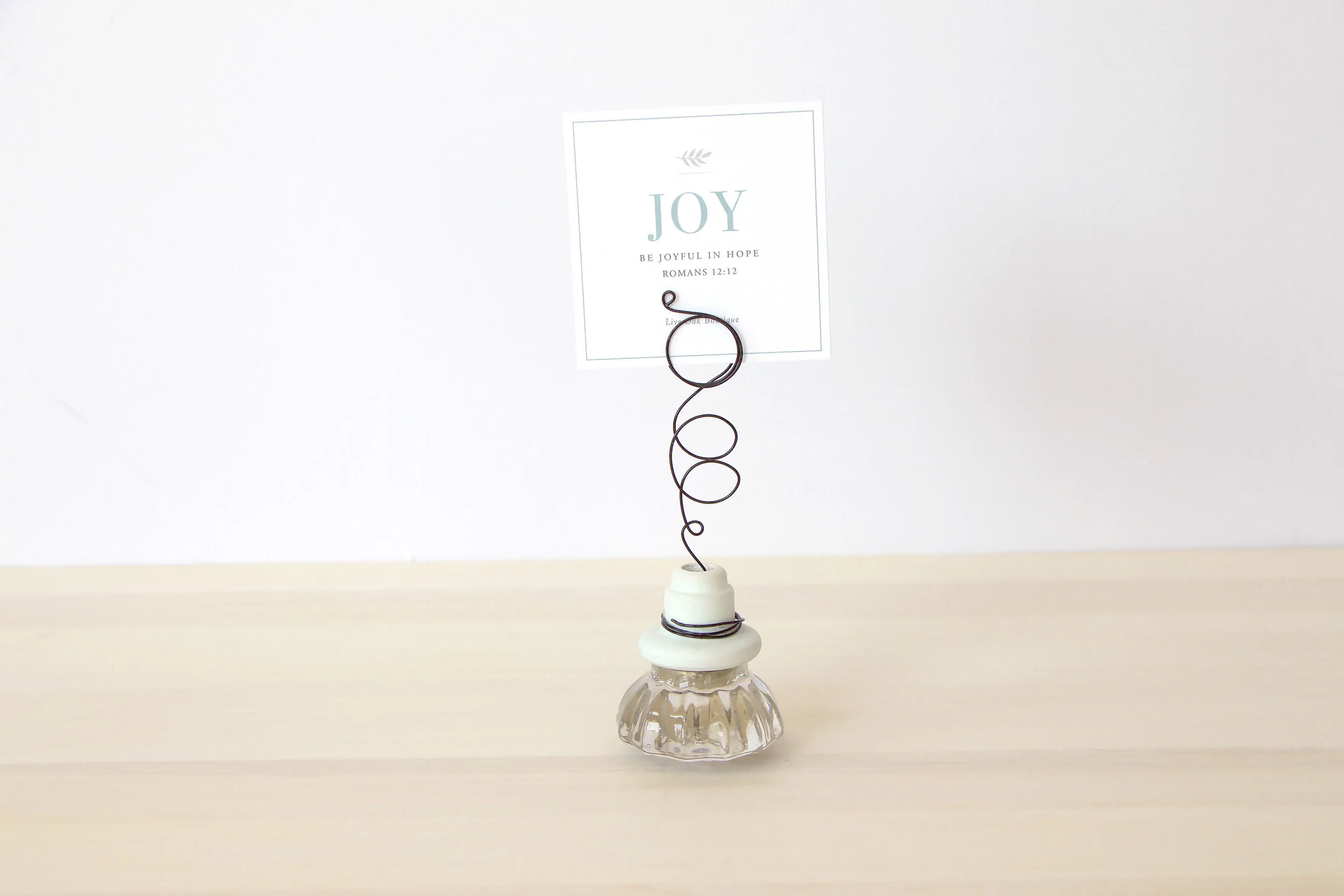 Vintage Glass Doorknob Card Holder from Live Oak Boutique. www.liveoakboutique.com