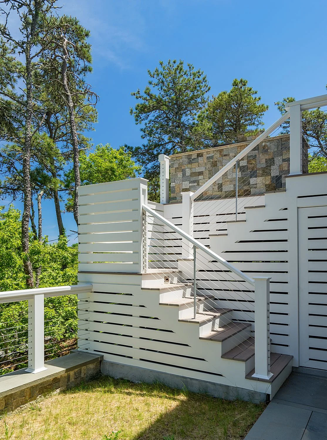 Stairs from deck to outdoor shower
