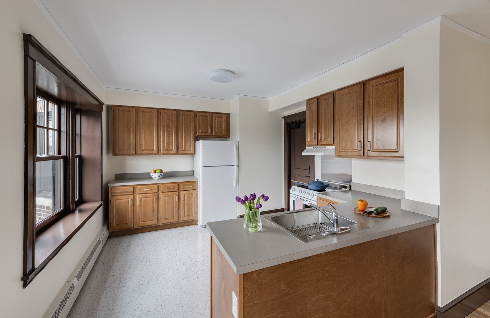 Multifamily housing kitchen with electric cooktop