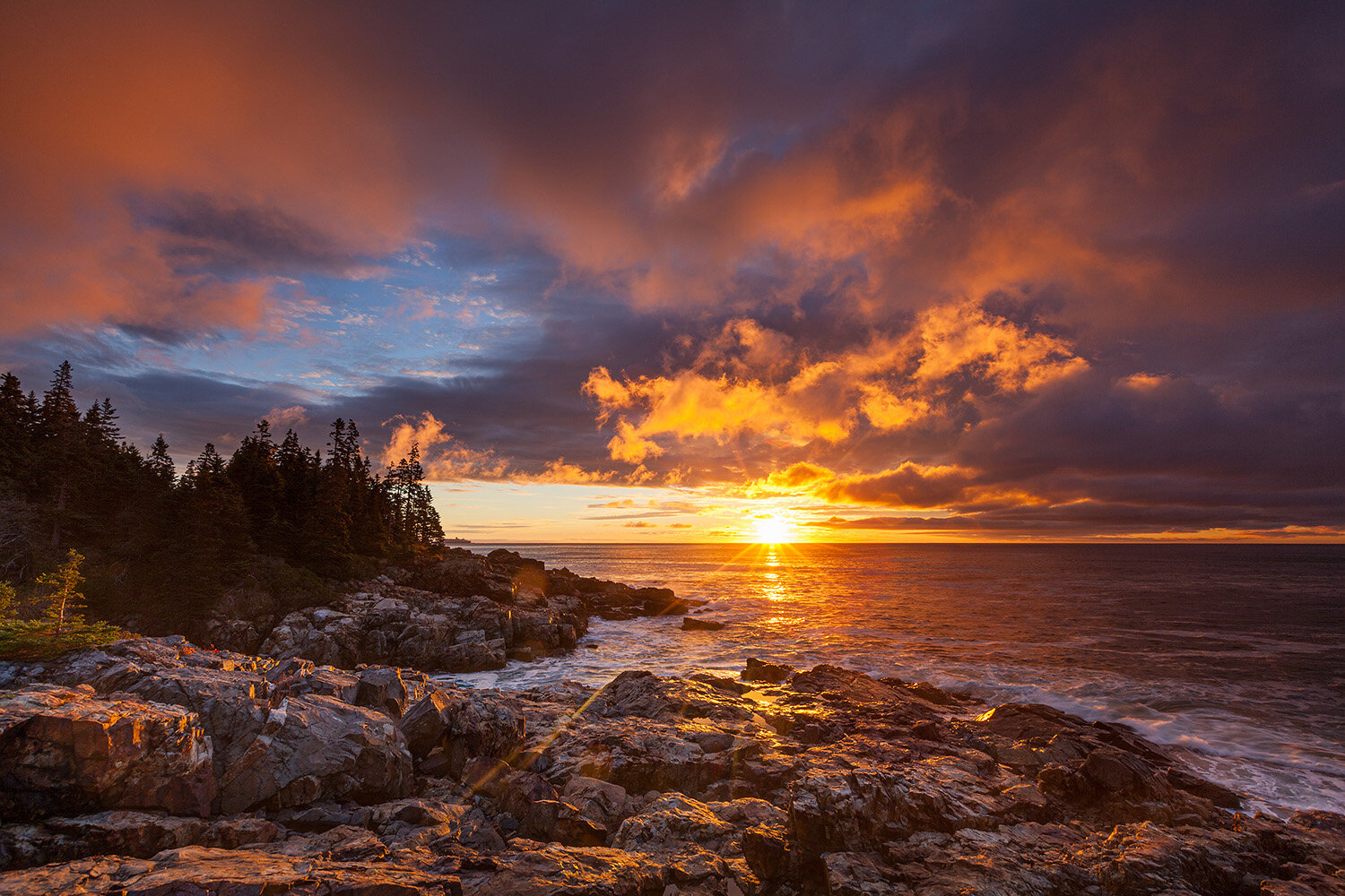 Sunrise along the rocky coastline of Acadia National Park, Maine