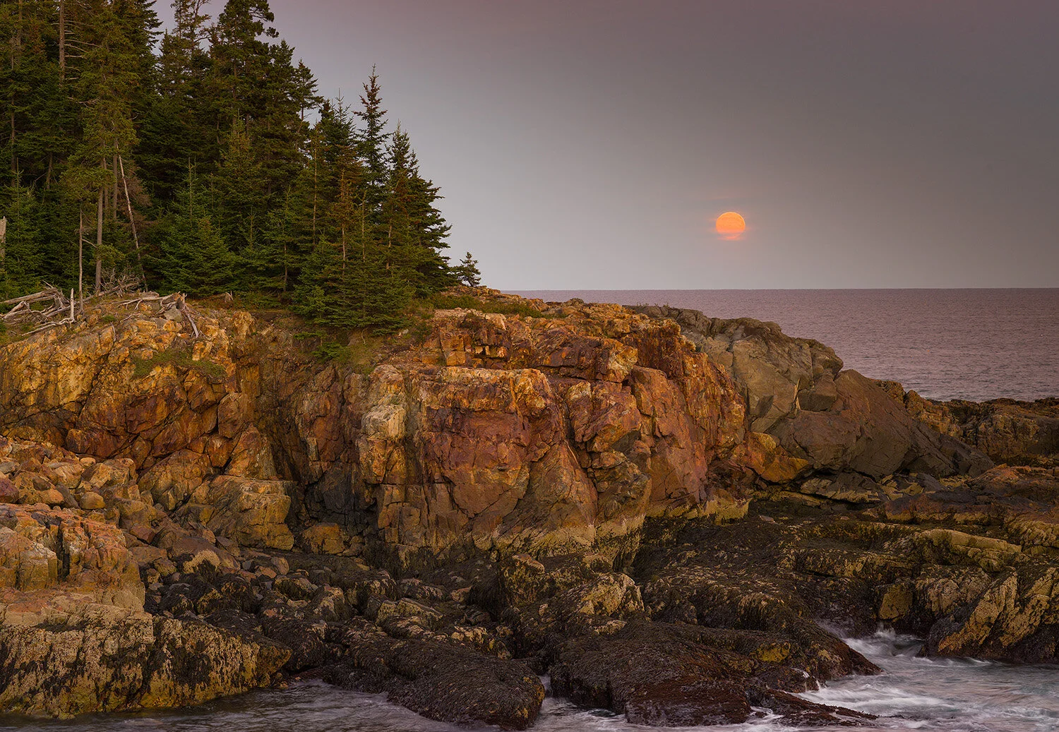 Full moon rising from Hunters Head, Acadia National Park, Maine,