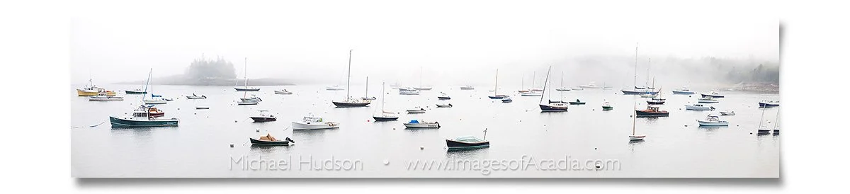 Boats on a misty Seal Harbor, on Mount Desert Island, Maine, USA