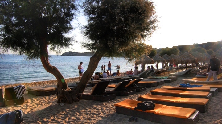  Namos and Paradise beach are party oriented beaches. Namos is more fancy, with yachts parked in the ocean, private parking and boutiques. Paradise felt like in spring break. People camp in that area. The waters are clear and scenery is beautiful, but don't expect a quiet beach!
