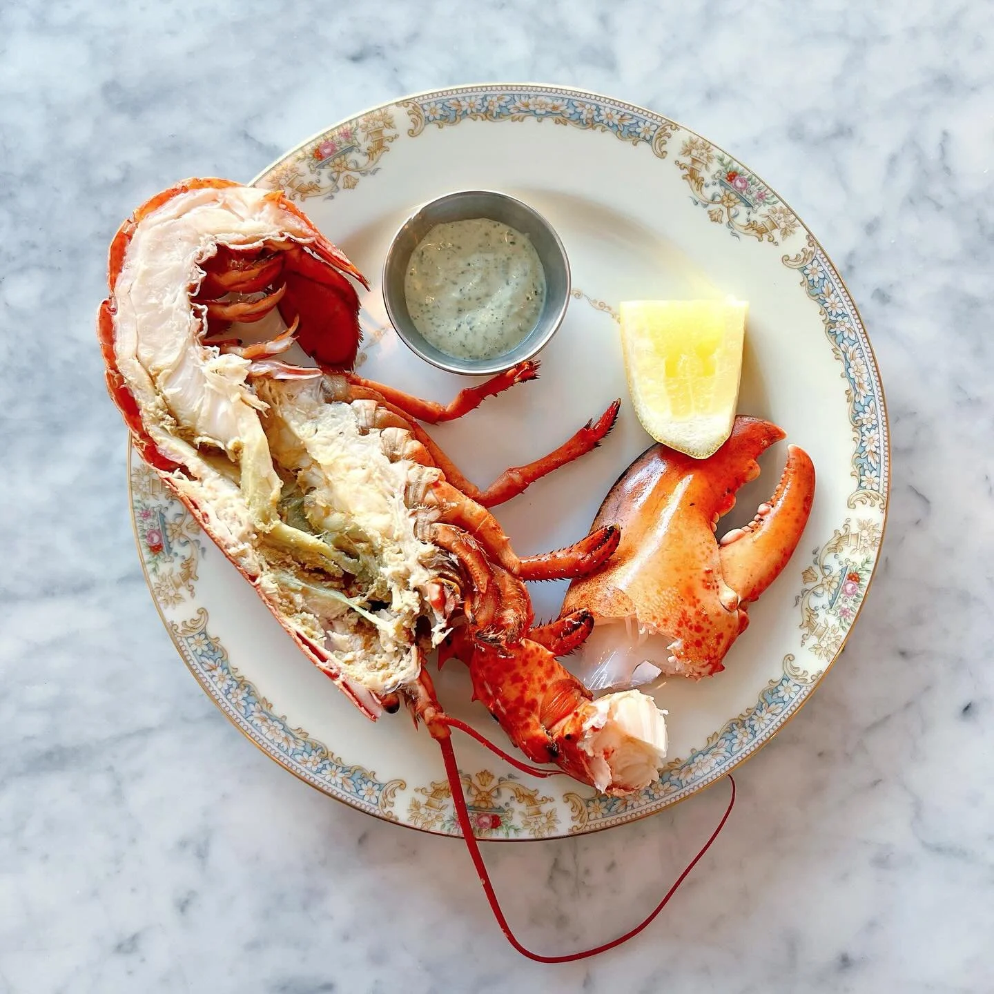 Chilled half lobsters for the long weekend. Byo bib.🦞
