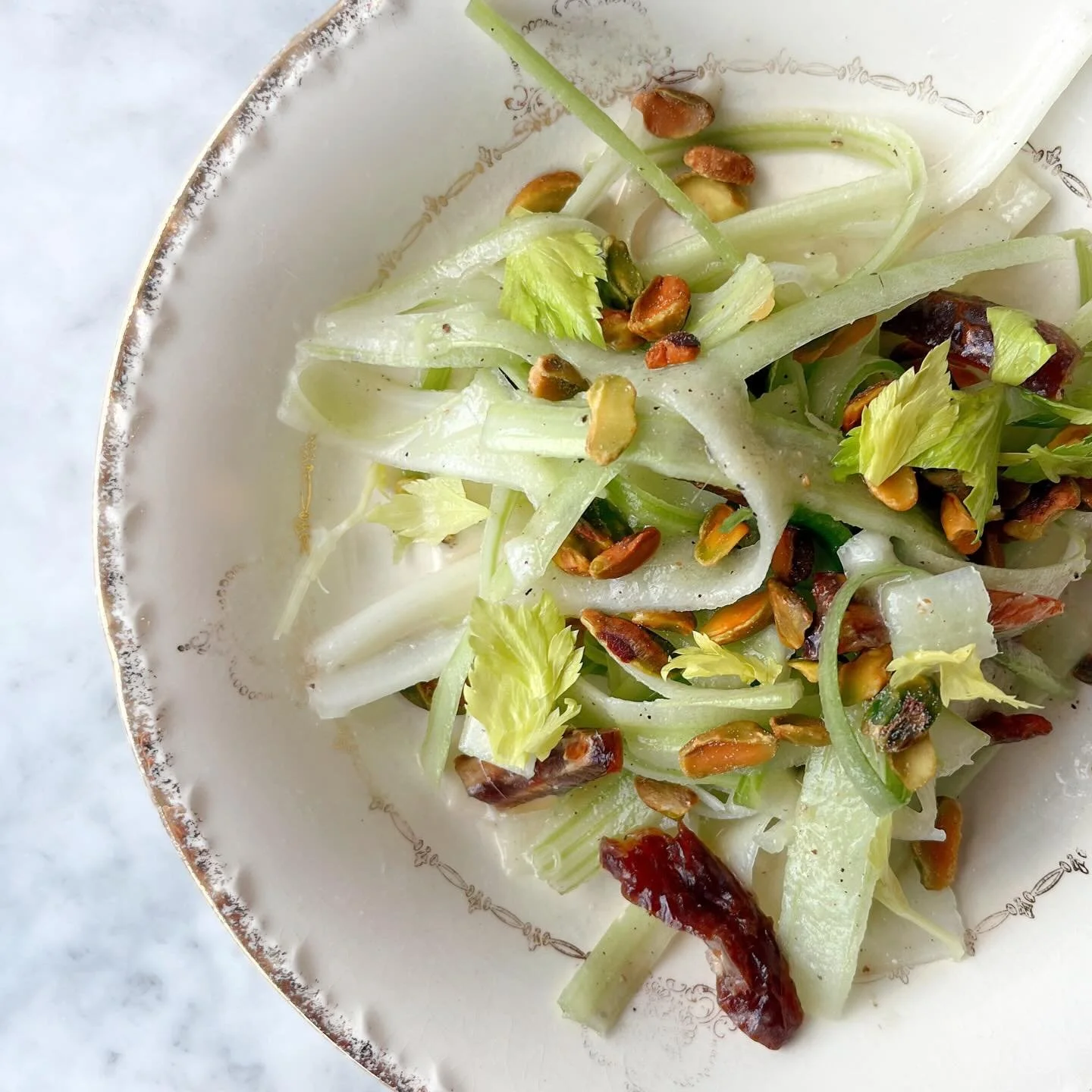 Stupidly good Celery Salad with dates, pistachio and lemongrass. This and a glass of sparkling Mauzac Vert. 🪄