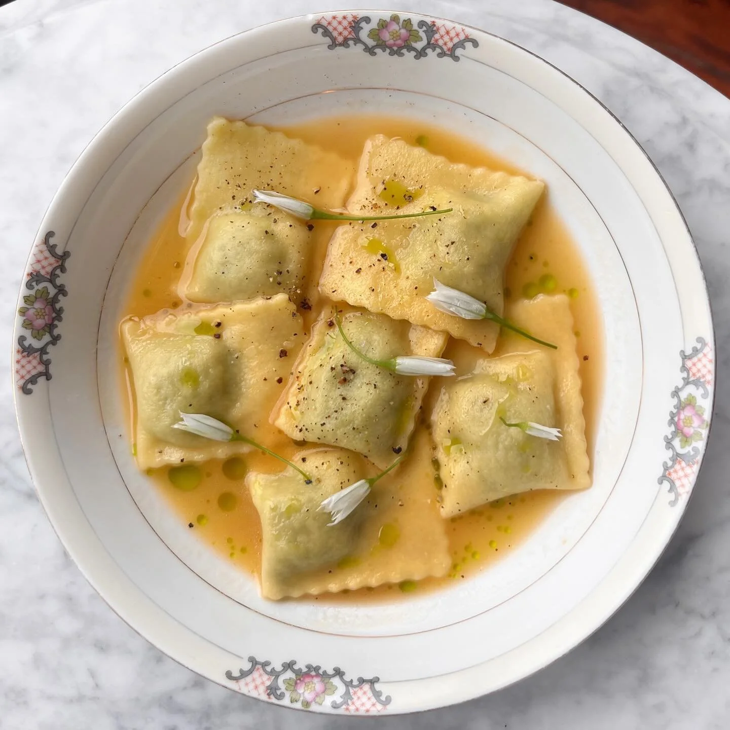 Rustica forever 🌱 

Ravioli stuffed with house-made ricotta &amp; nettles in a rich vegetable broth drizzled with green wild onion oil. This pretty little dish has been around for a couple weeks now, but we thought it needed its own spot on the grid