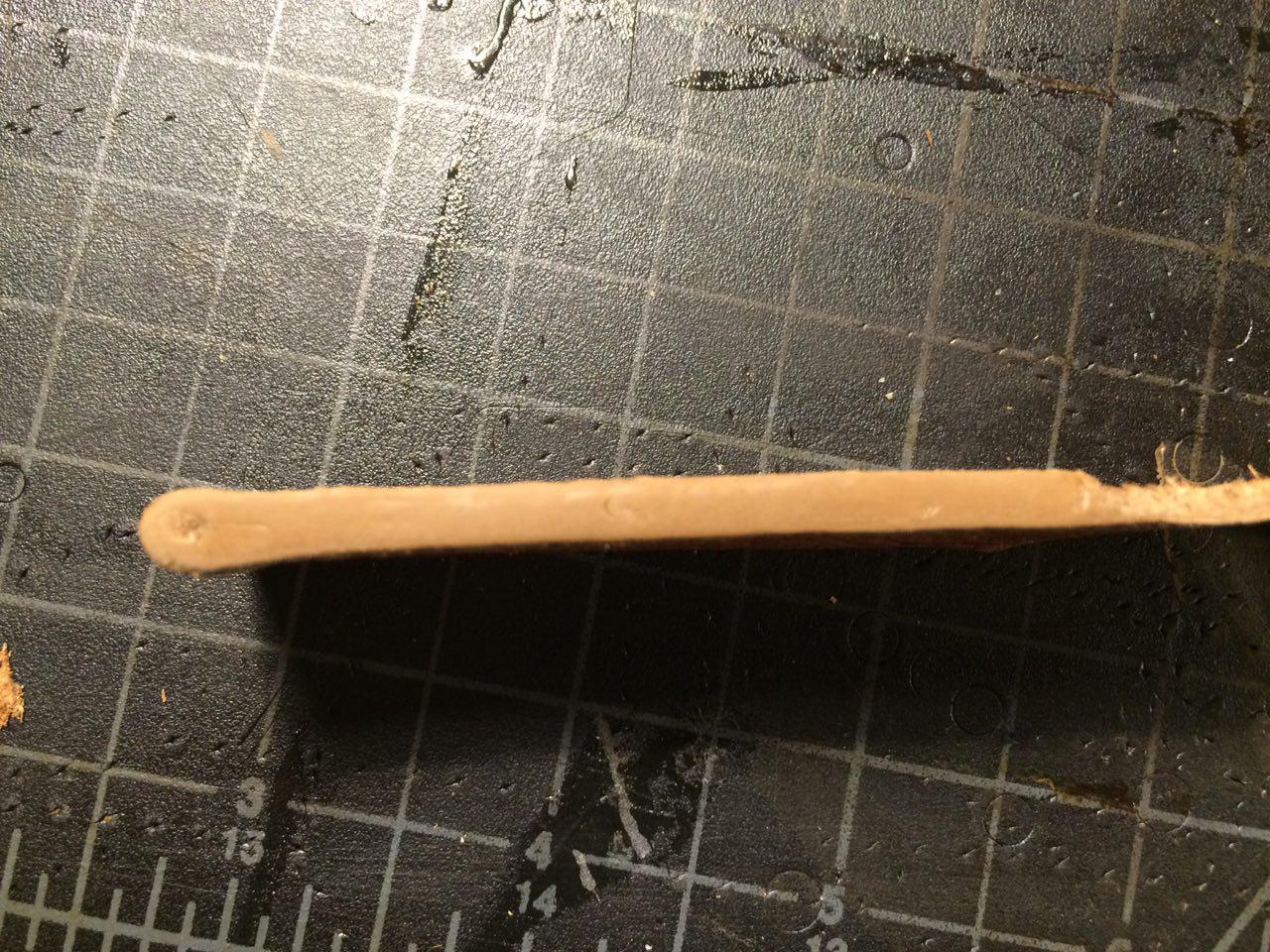 This is my first two layers just after sanding. You can see a few inconsistencies. The one in the middle and the one on the right were caused by not waiting long enough for the paint to dry. The one on the left however, was from not enough paint. I should've applied another coat and evened it out again, but I did not and you will see the mistake in my final product.