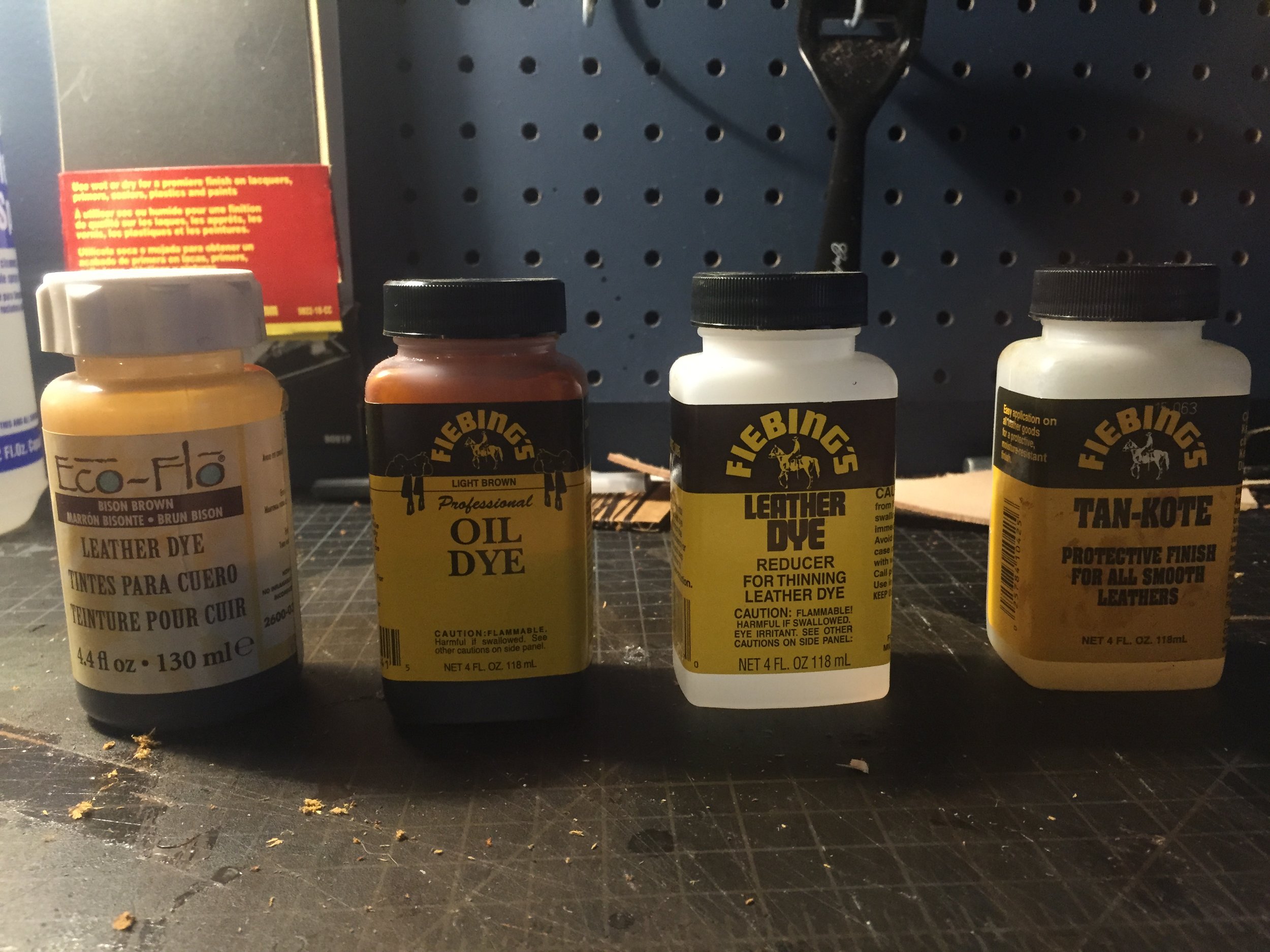 From left to right: Water Based Dye, Oil Based Dye, Dye Reducer, and finally Tan-Kote Leather Finish