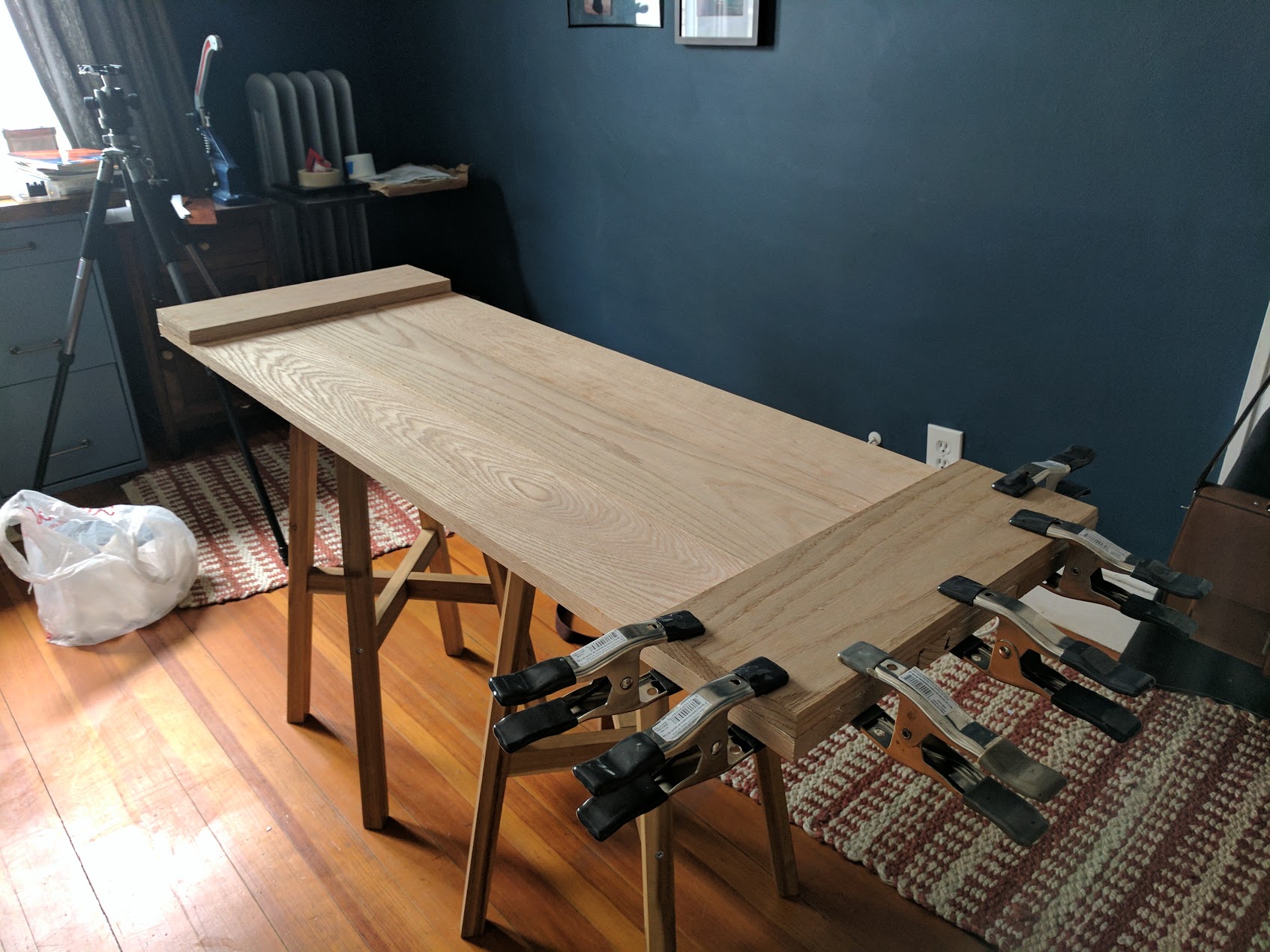 Boards clamped together after gluing.