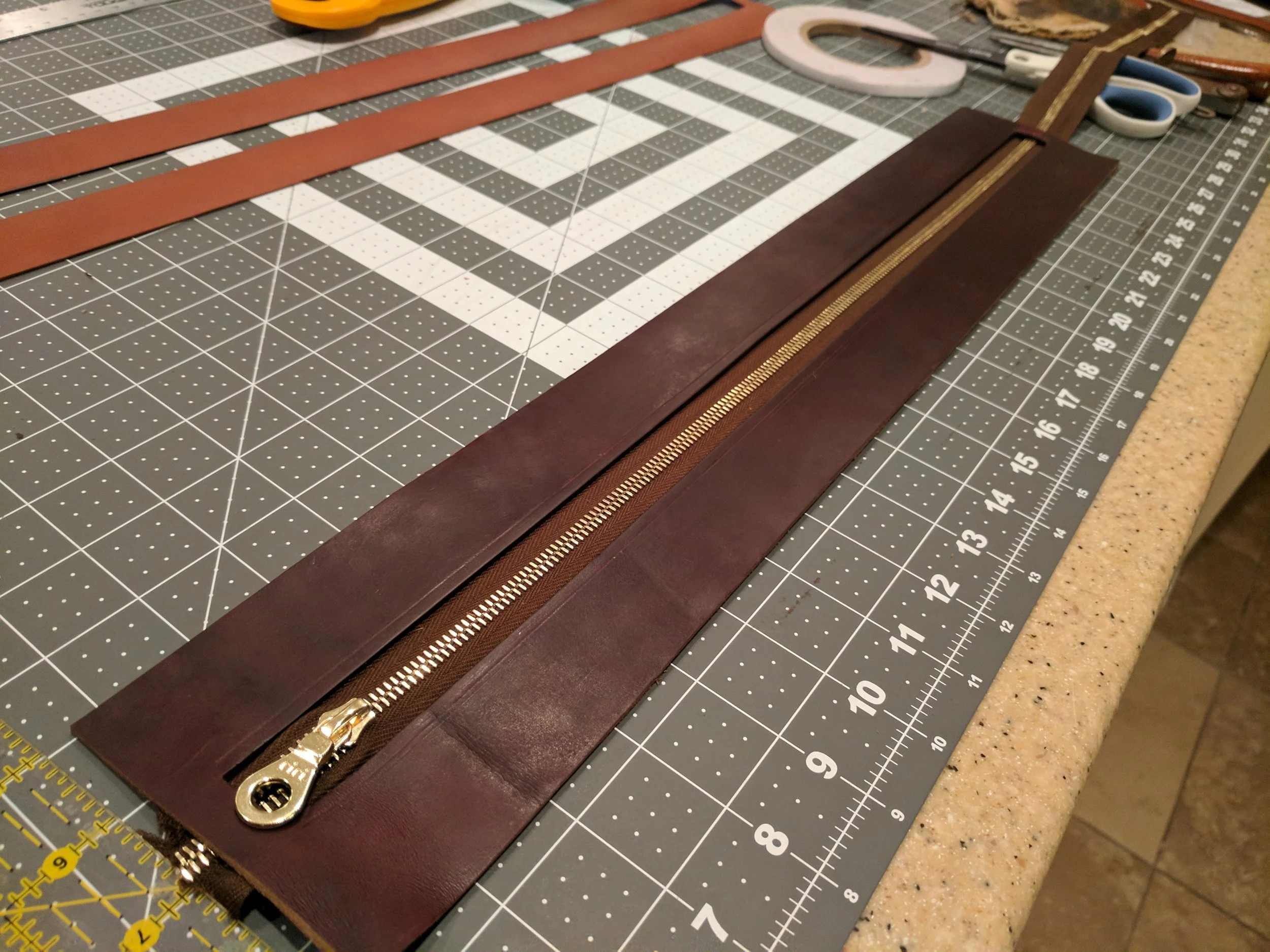 Quilting tape magic applied. Just need to trim the zipper and stitch into place.