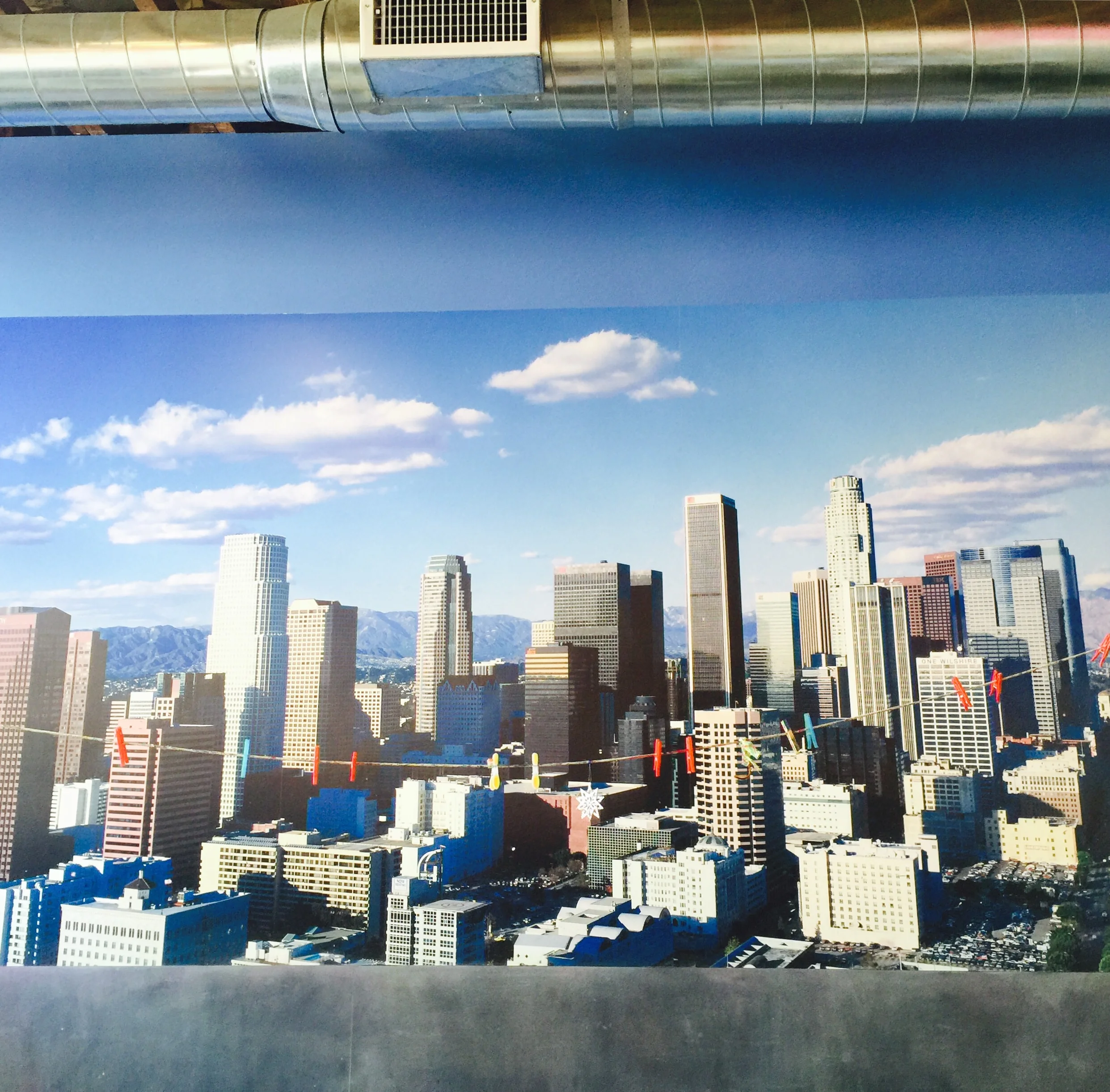 ( Ed. note: neither of our boys painted this. Nor is it the view from Play. It's just a big, cool, photo in the studio.)