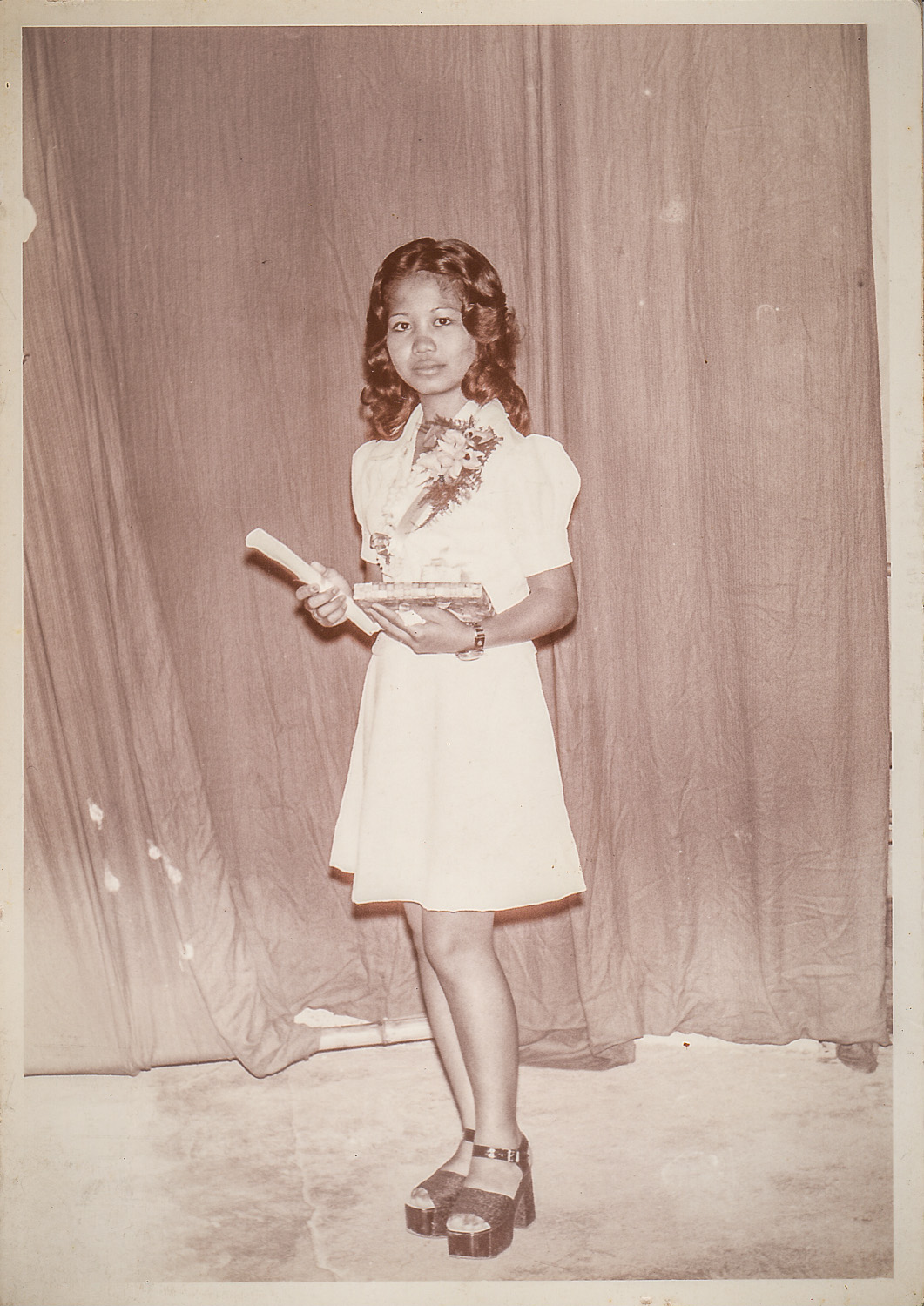 Ate Del graduating from high school. She was probably 16 or 17 yrs old. Those shoes, those killer shoes.
