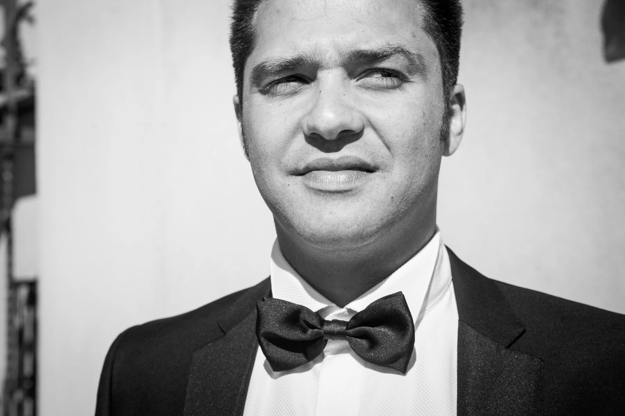 A few black-and-white photos of grooms getting ready
You might think you don&rsquo;t need this moment to be photographed
I think you do

#naturallight #weddingreportage #destinationweddingphotography #groomgettingready #preparazionesposo #reportagema