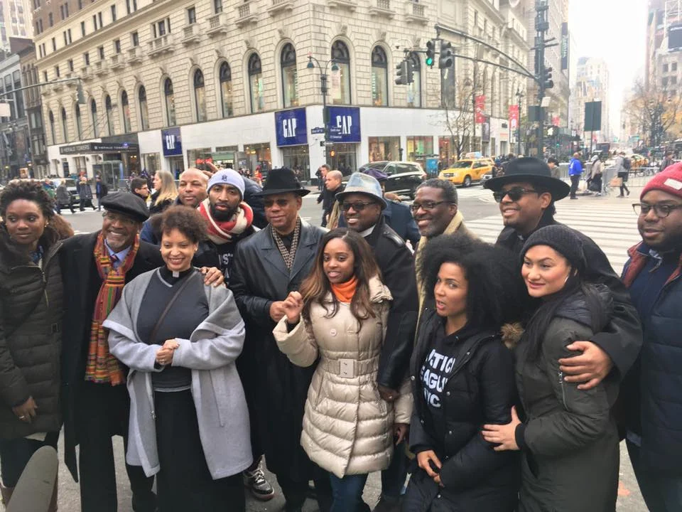 Members of the Justice Now! Coalition stand together following today’s “Economic Shutdown 2.0” demonstration.