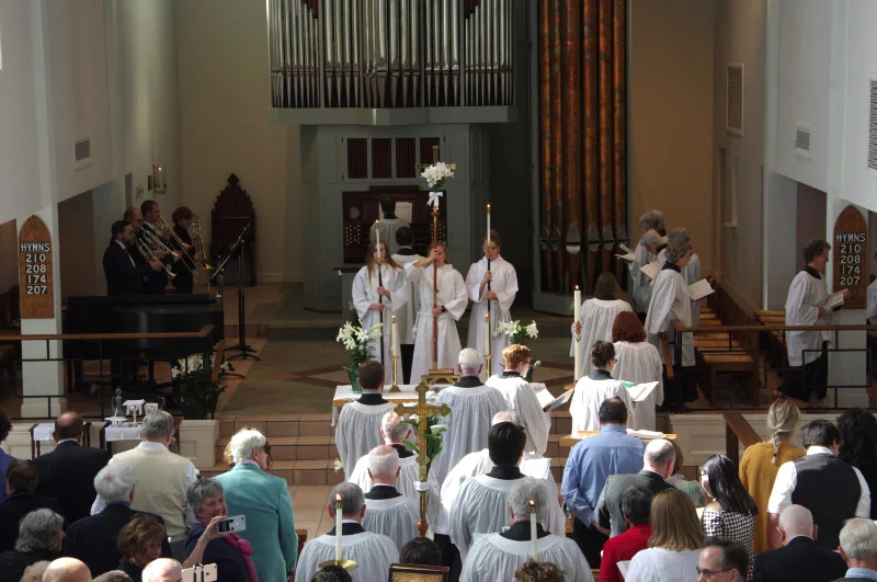 The entrance procession on Easter Sunday morning with choir, acolytes, brass quartet and organ leading congregational singing.