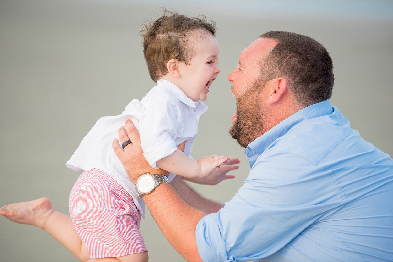 Candid father and son moment