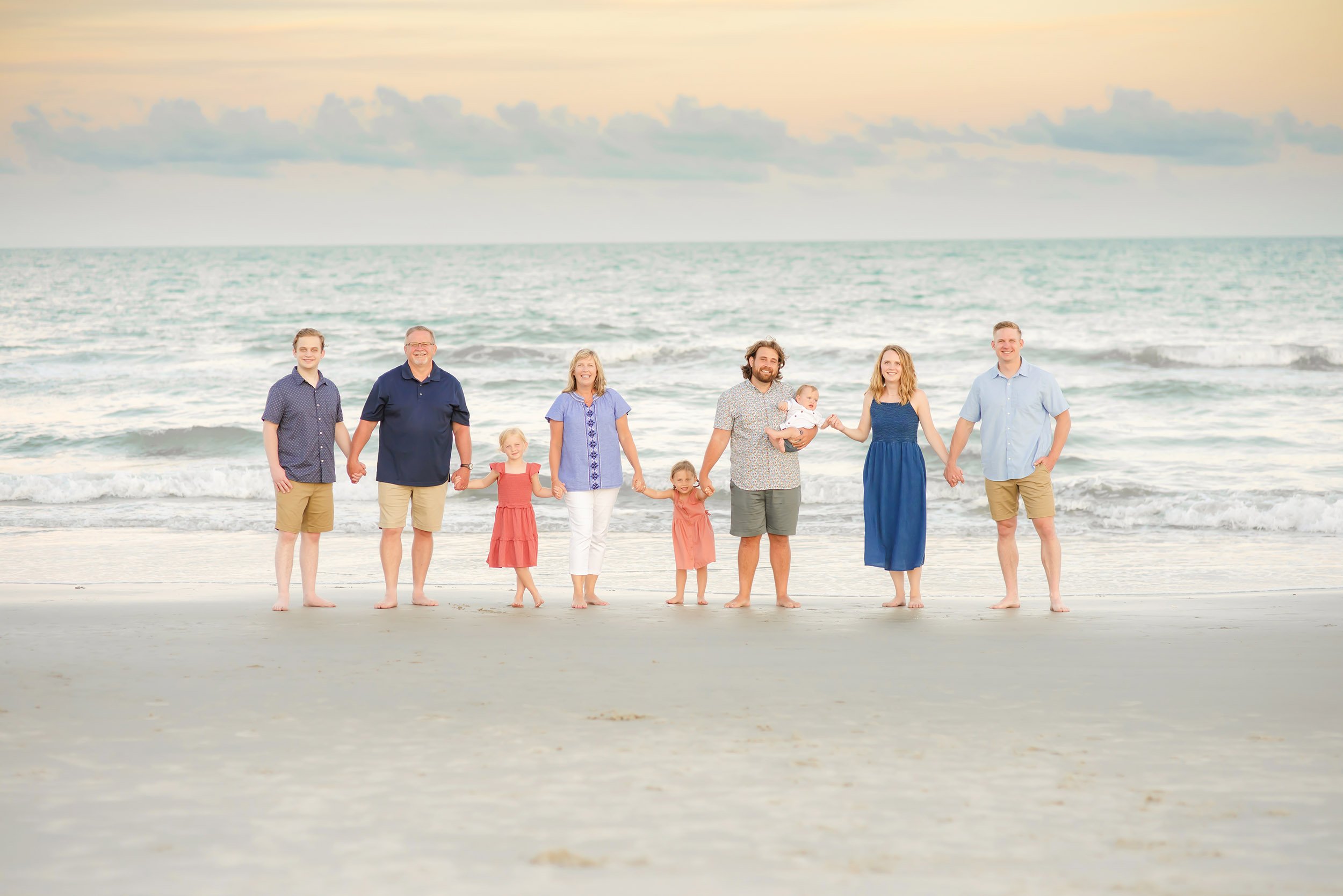 Family walking on beach