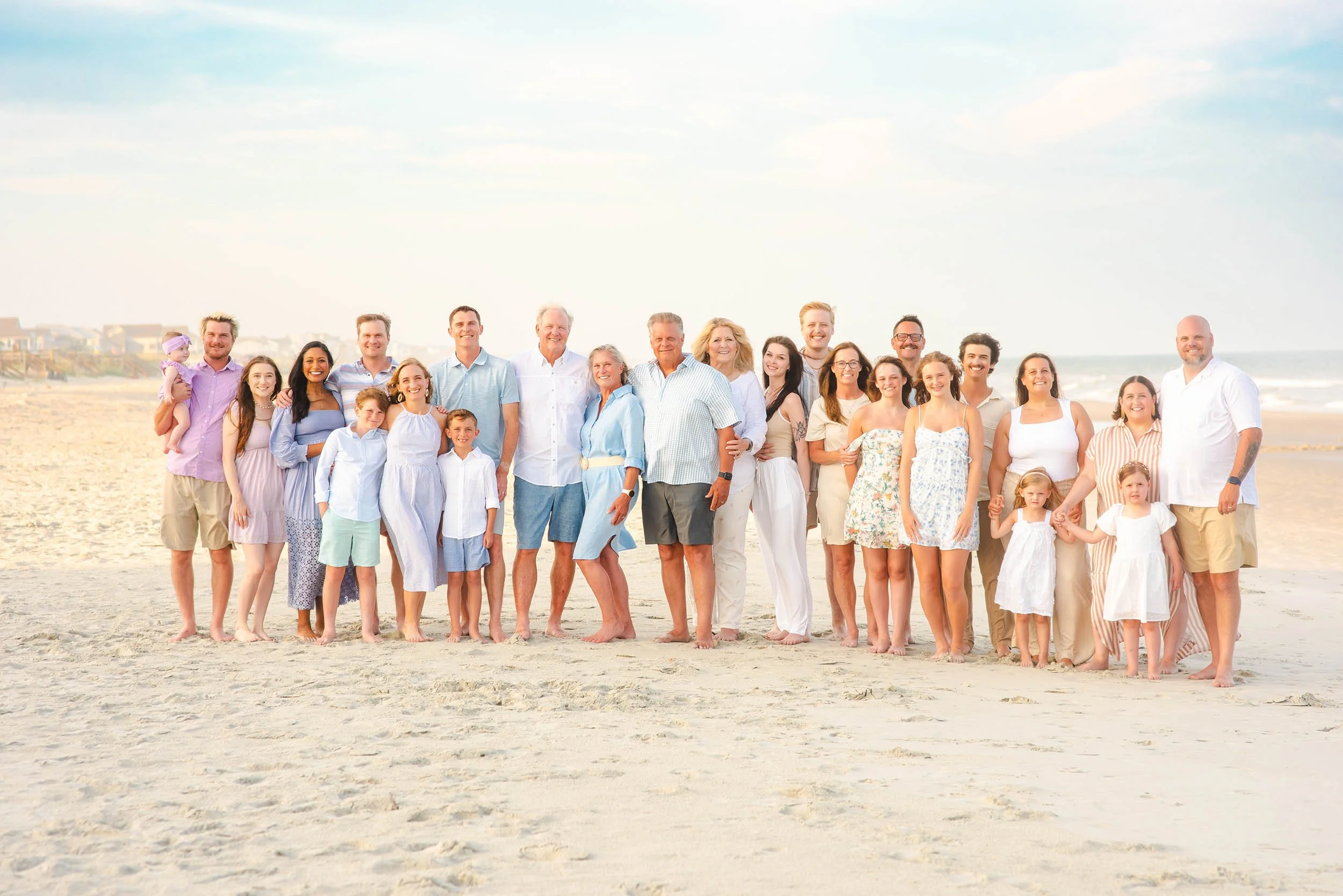  Multi-generational family photo session in Litchfield Beach SC during sunset with ocean background 