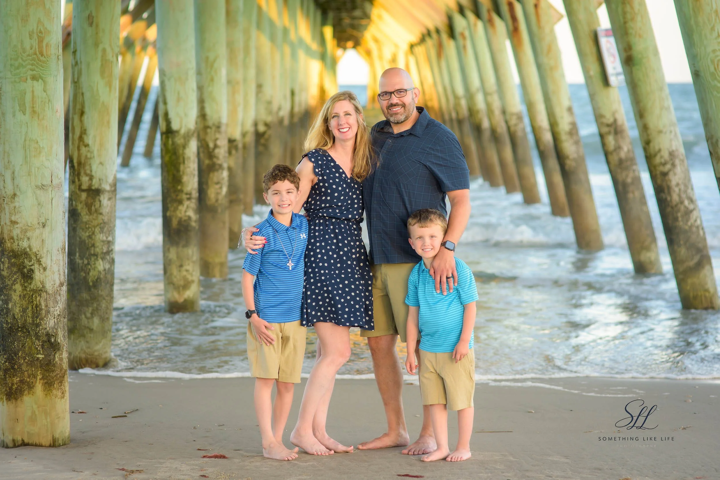 Family Photography Under the Pier at Myrtle Beach State Park, SC | Sunset Beach Portraits