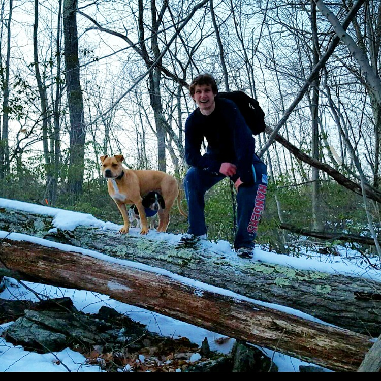 Gabriel staying close to his friend Delilah on a hike