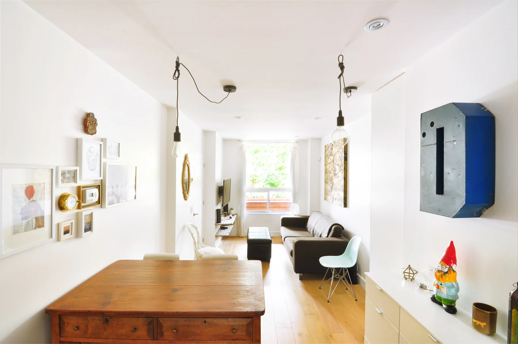The challenge of this project was to create two modern units out of a narrow rooming house that was cut up and divided into 7 separate bedrooms. 
