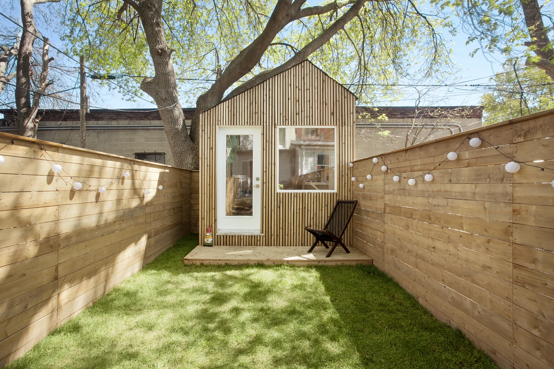 Created for a young family who needed a separate office and to expand their living space, Garden Studio is designed as a walled oasis and a safe green space for their 1 year old to run around