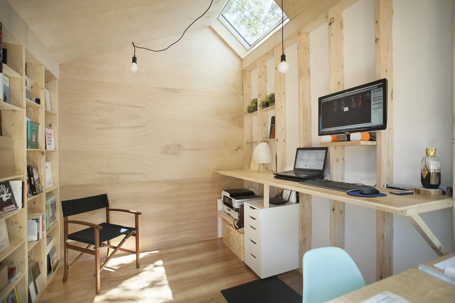 Custom storage between the wall studs free up floor space