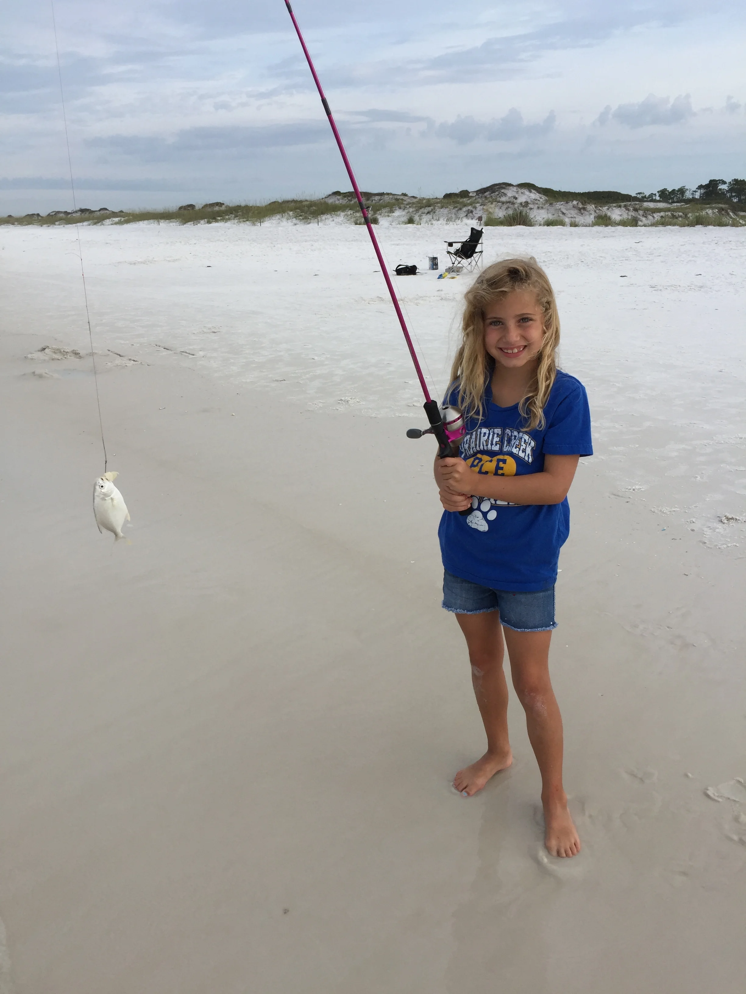 Her second fish was a bit bigger. but getting it close enough to take a picture . . .