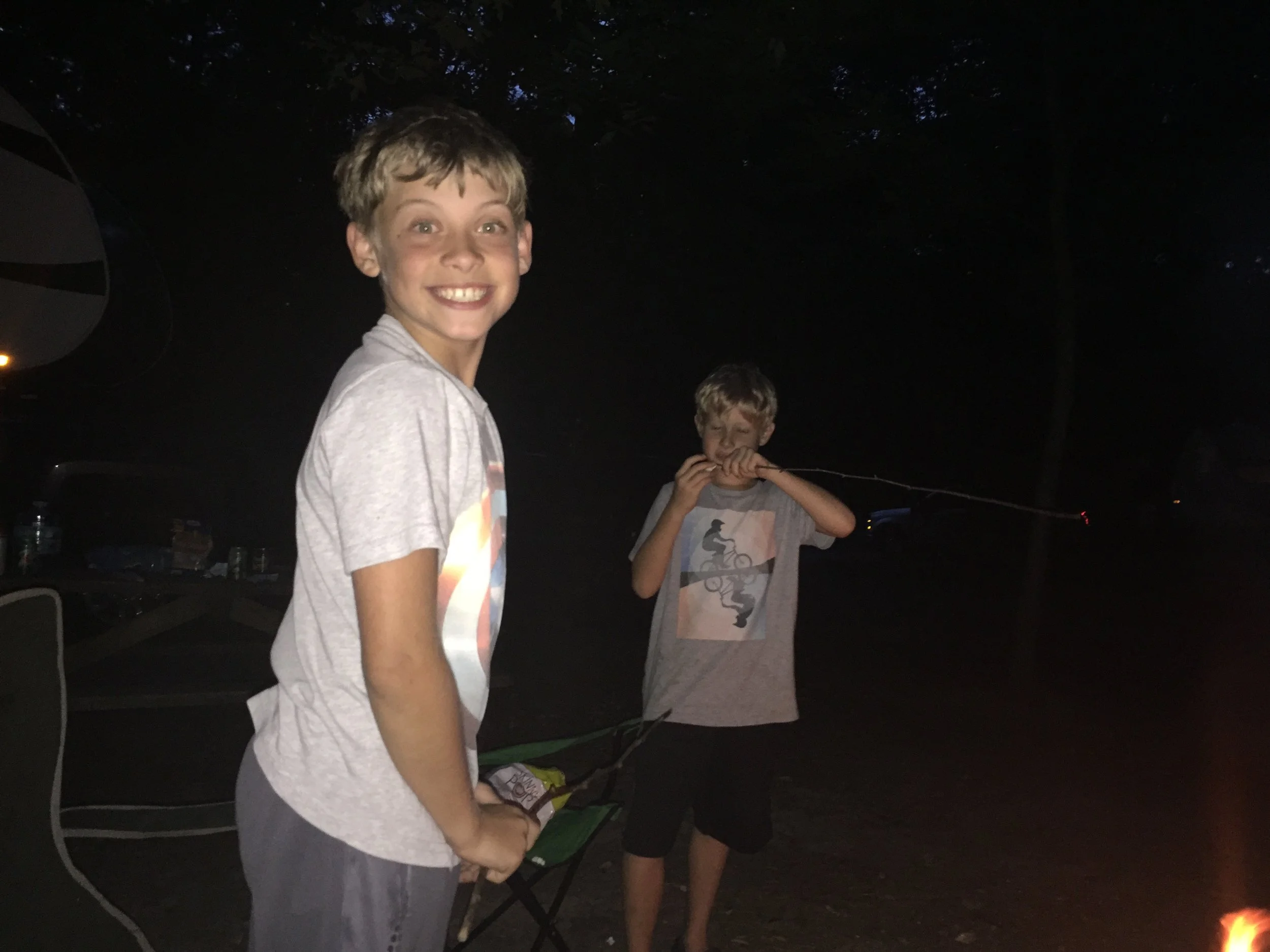 The boys didn't have marshmallows to roast, so instead they used Skinny Pop Popcorn. I don't think it was a culinary success, but the boys were in it for the experience.