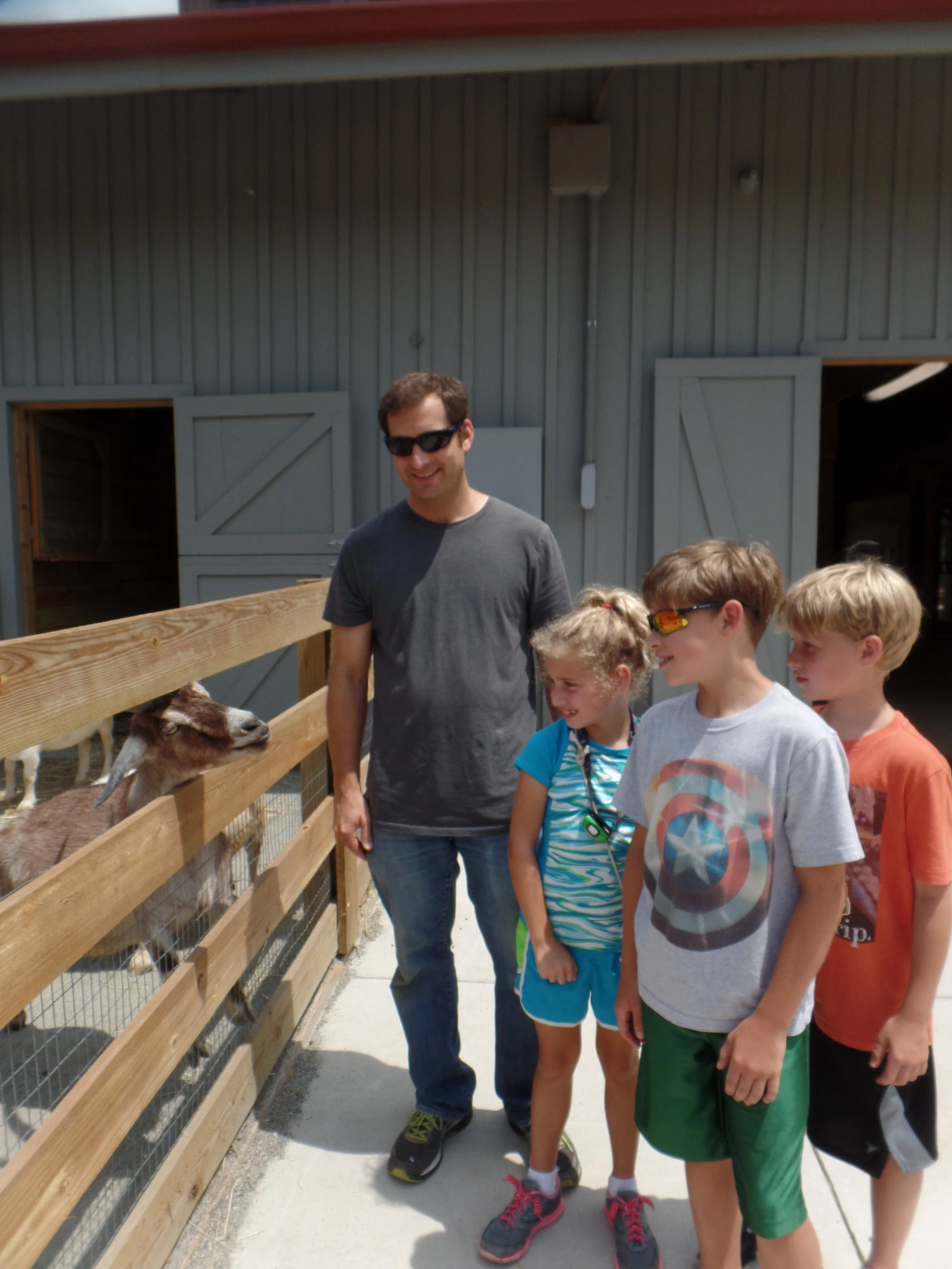 The goat was having a heart-to-heart with the family. Or maybe he was just hoping for food.