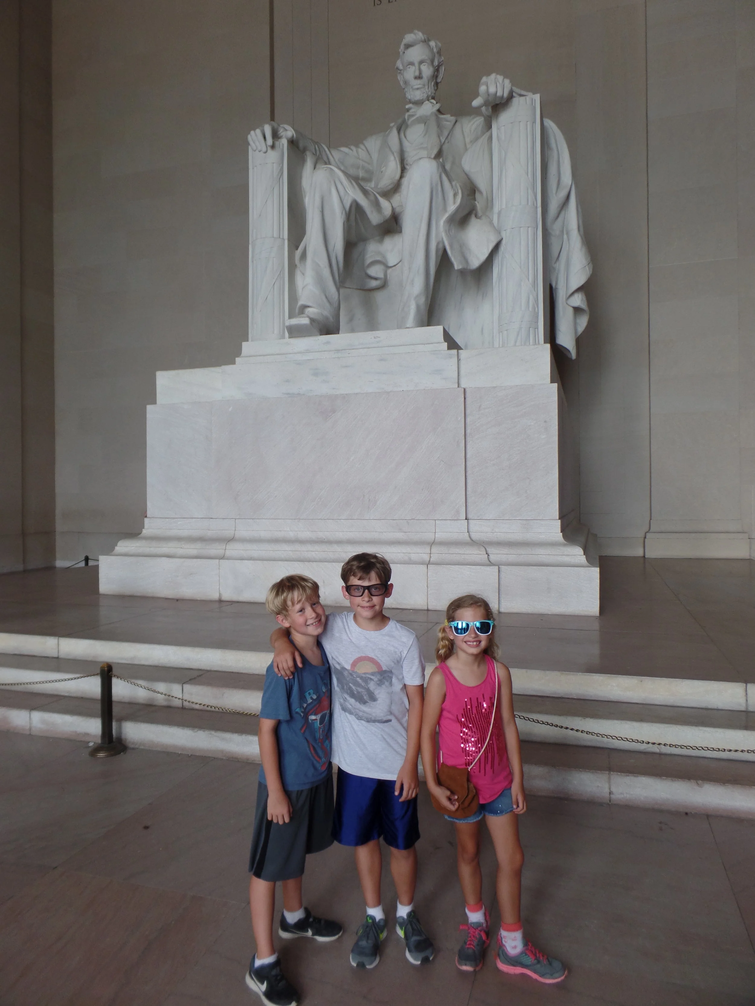 My favorite part was when we rented bikes. This meant we got to make it to several monuments. Here the kids are posing with Mr. Lincoln.