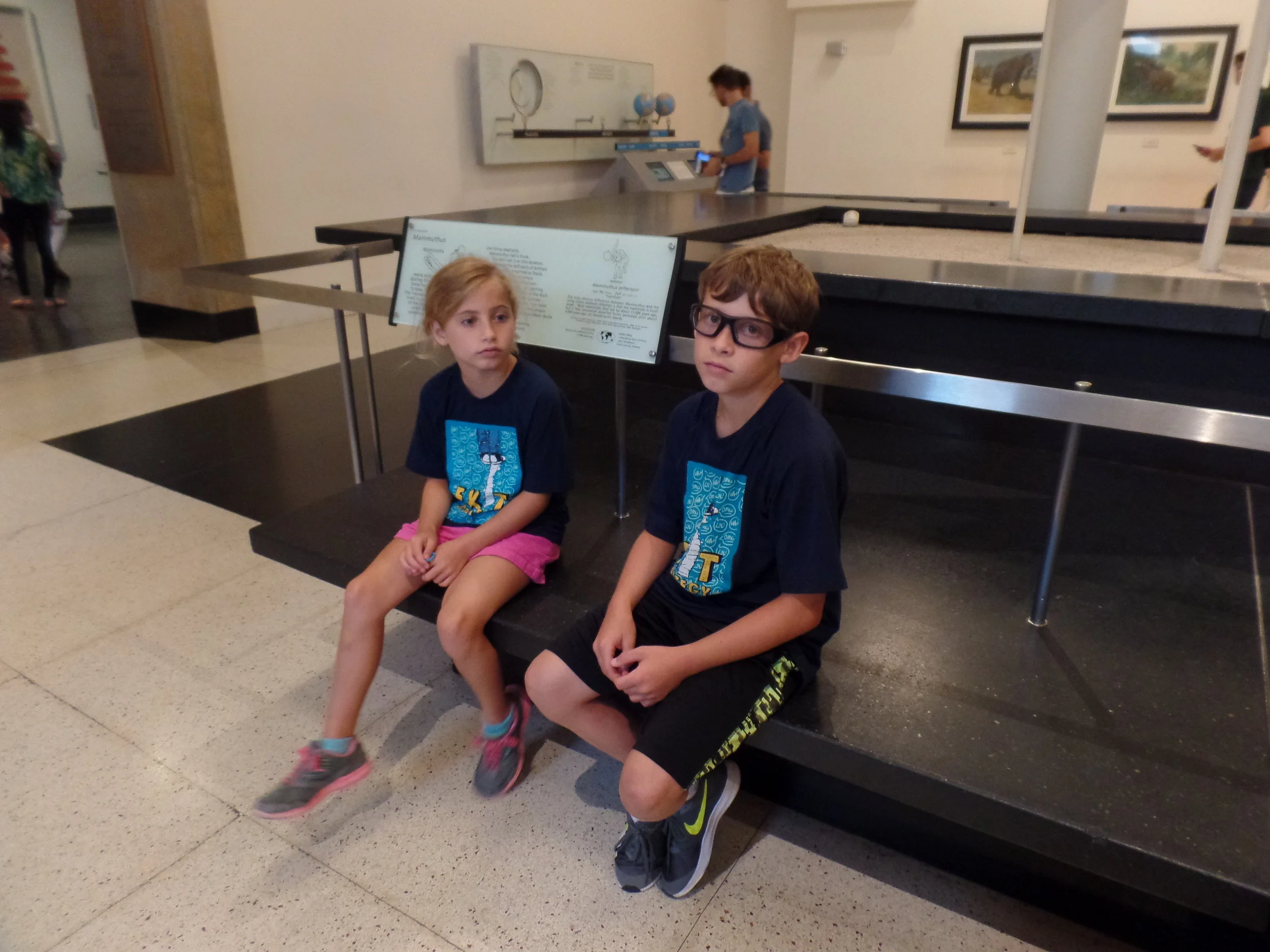 This is the expression of kids that are Over. It. They were also unimpressed by their parents antics.