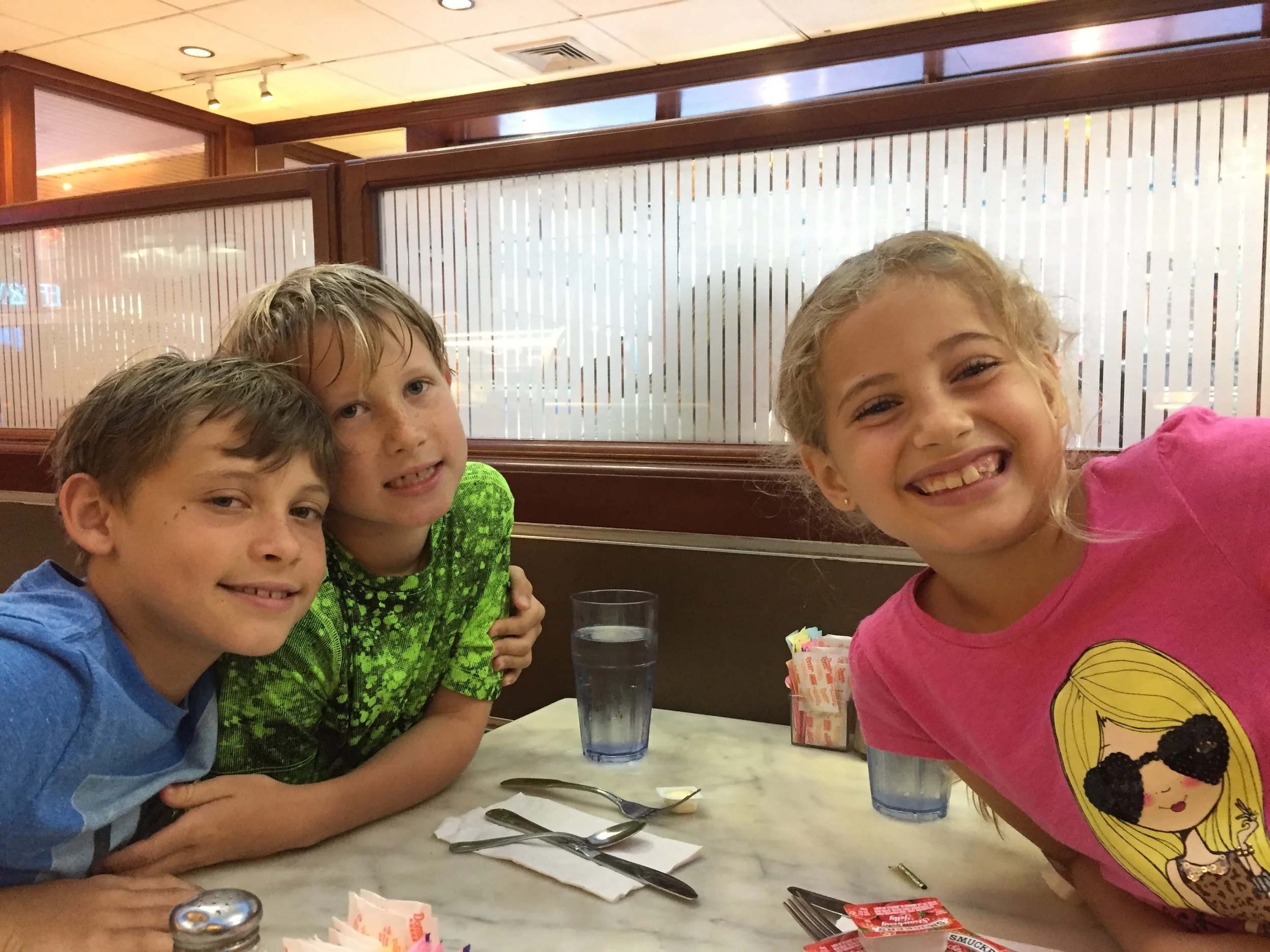Here they are smiling before they ate their weight in syrupy, carby goodness.