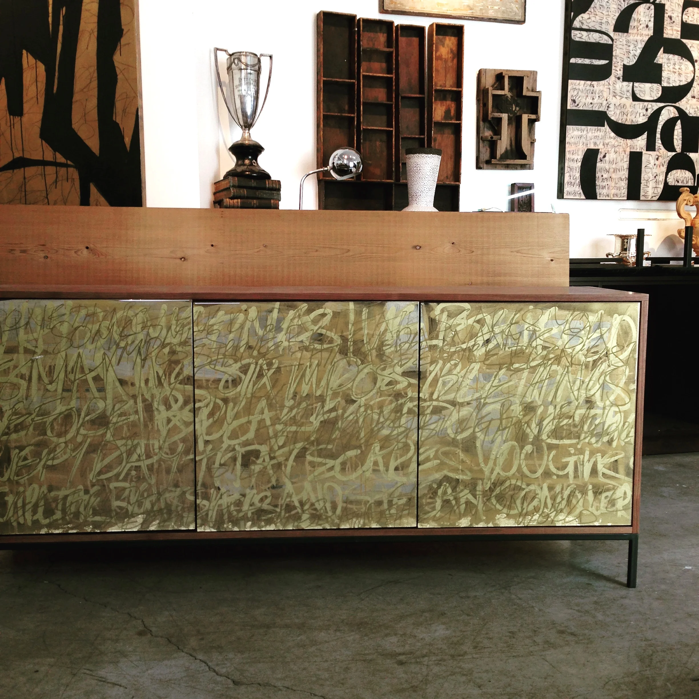 Morgan Clayhall studio, featuring Gold Graffiti Cabinet and artwork by Murray Duncan