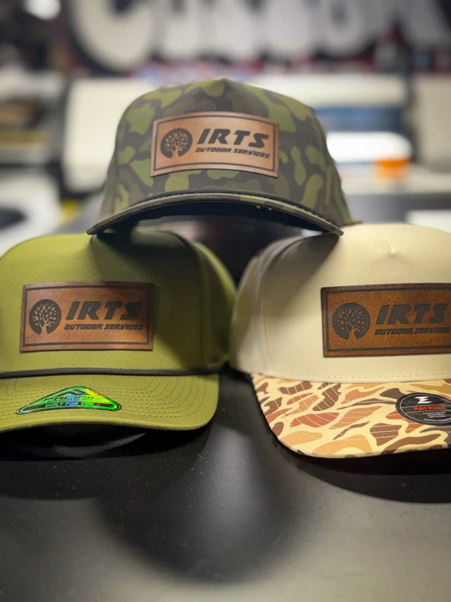 Clean. Rugged. Built to last 🔥🧢 
Custom leather patch hats done right for IRTS Outdoor Services 🌲 
Perfect for job sites, crews, giveaways, or everyday wear 

If you need custom hats for your business, brand, or team, we&rsquo;ve got you covered f
