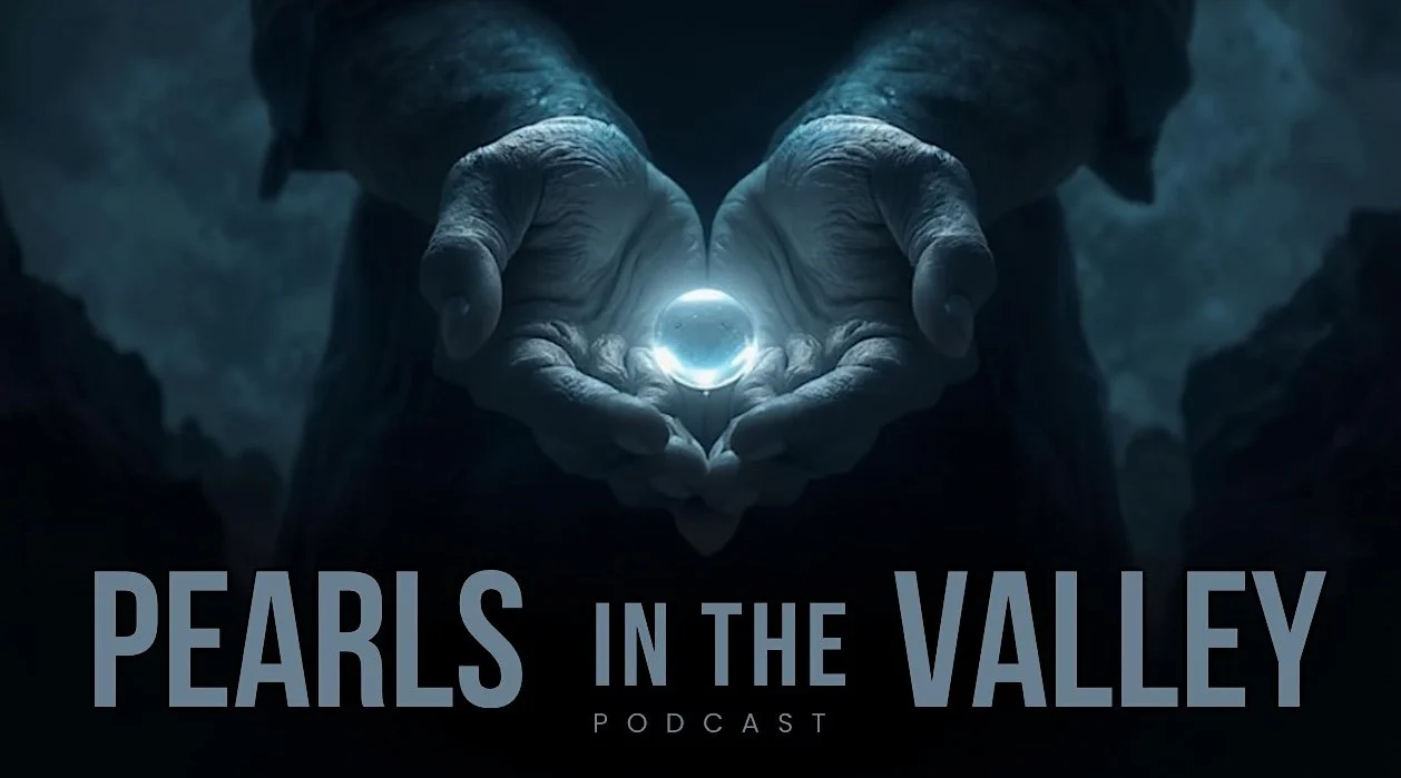 Close-Up of Hands and Pearl in Shadows.jpeg