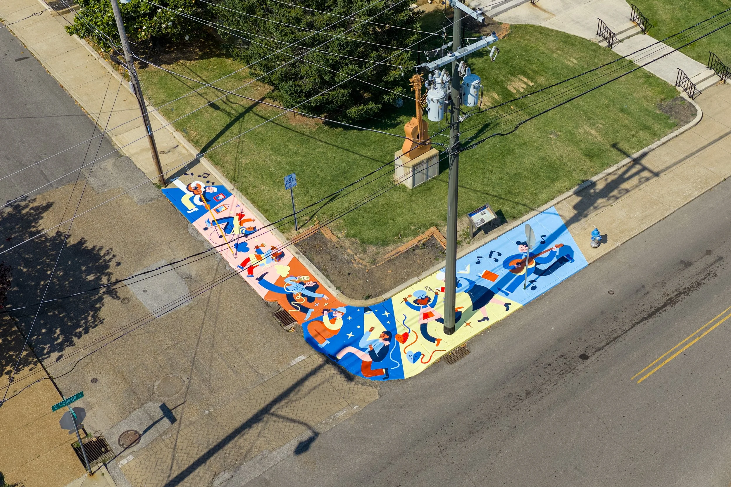 Everyone’s Invited to the Parade: The Creation of the Newest Sidewalk Mural in Downtown Jackson