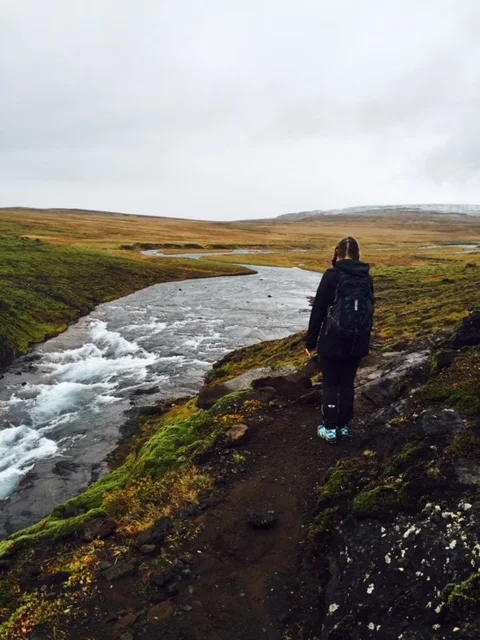 Jill realizing there is no way to cross at the top of Glymur. We must go back down.