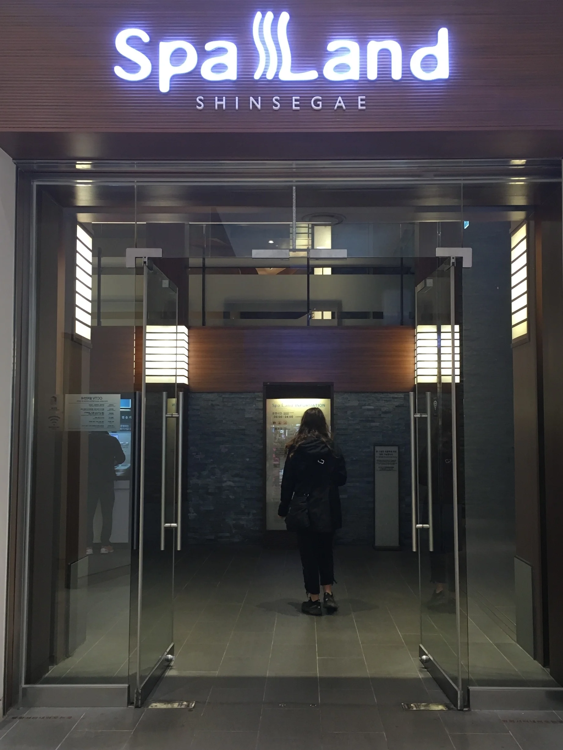 Jill entering into the promised land of Spa Land in Busan, South Korea.