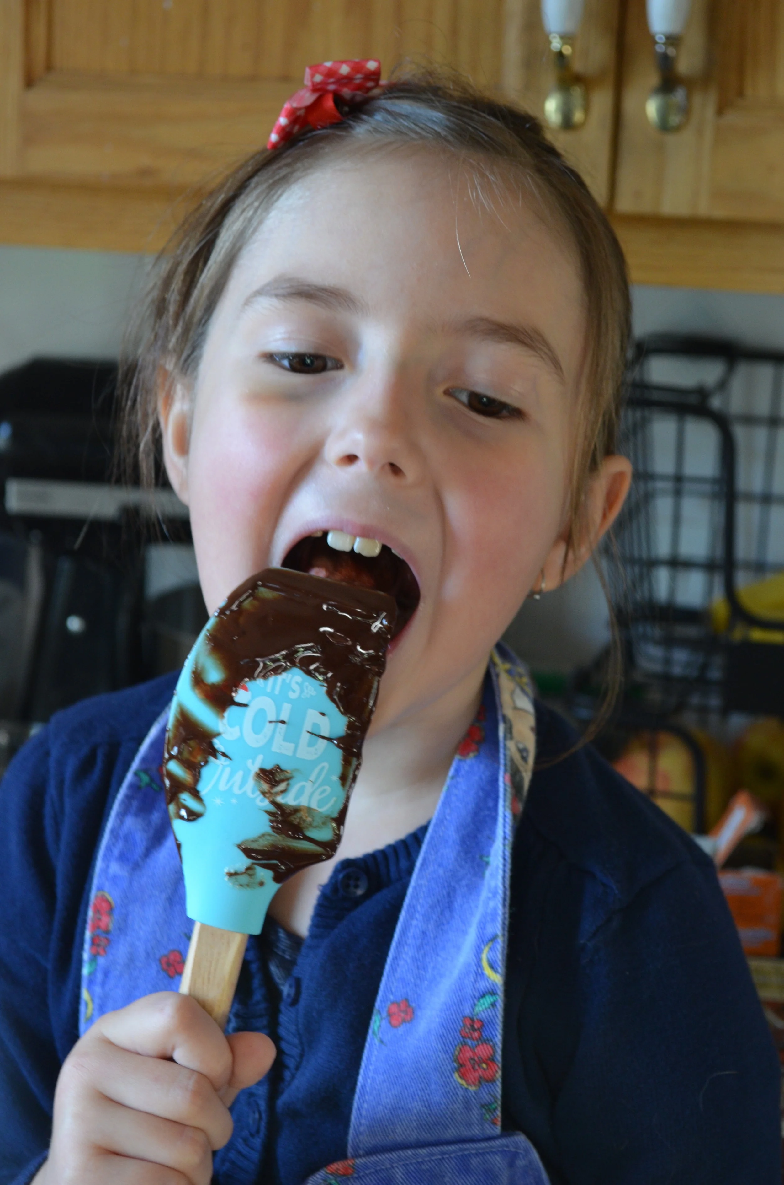Don't forget to lick the chocolate off the spatula! (Don't worry, we used a new one for the rest of the recipe!) 
